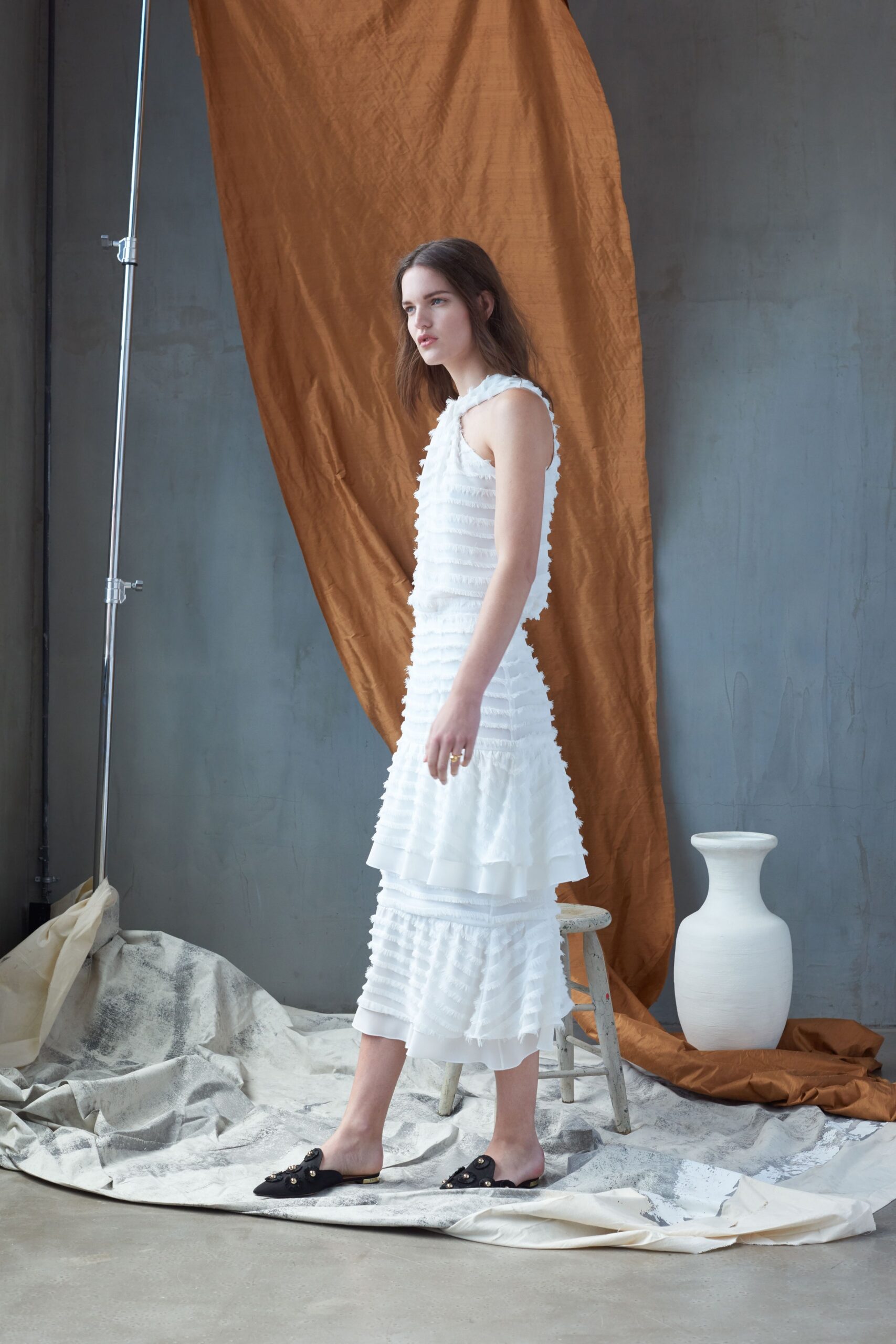 white pleated midi dress