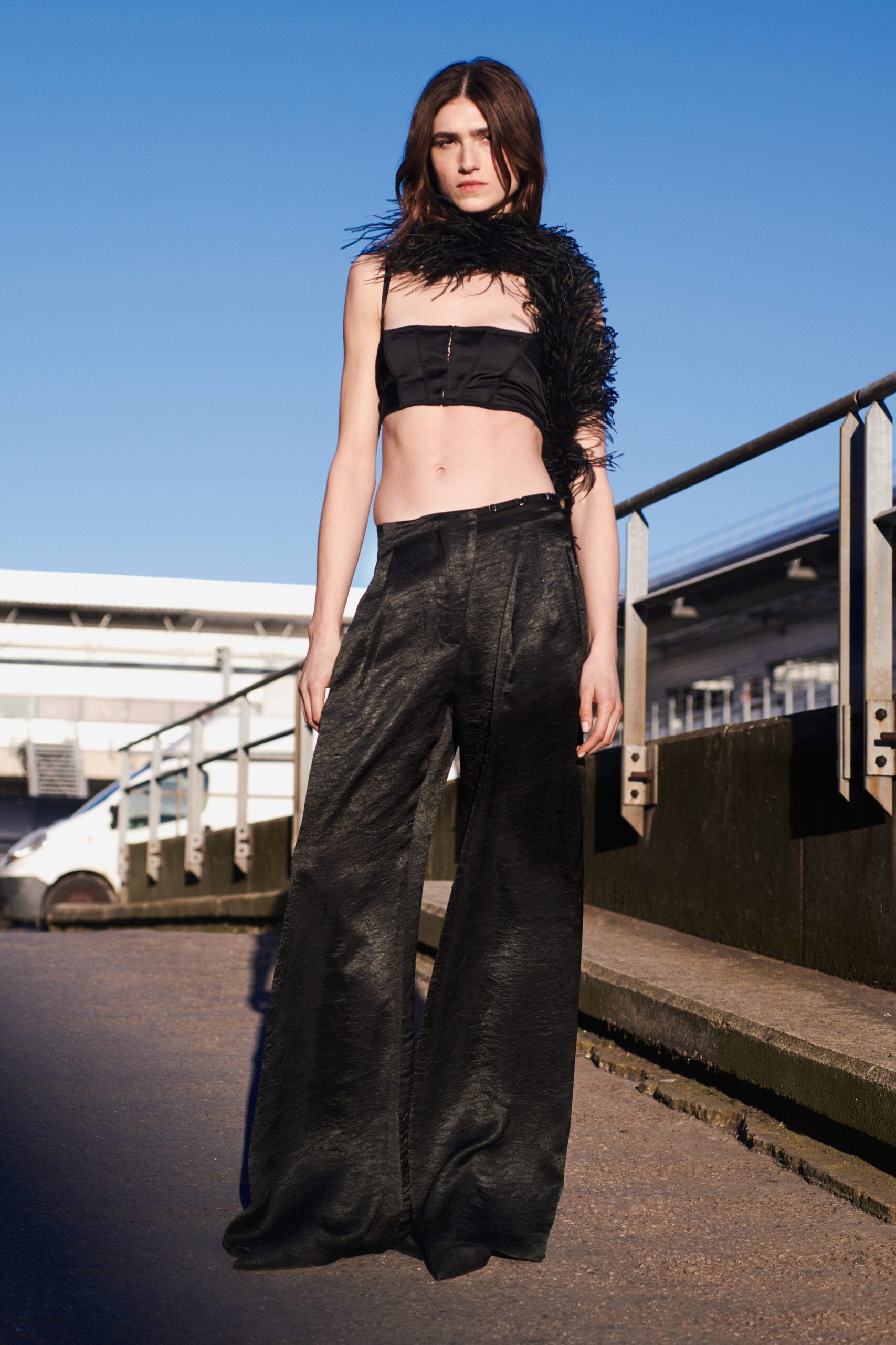 black silk fitted top and relaxed pants