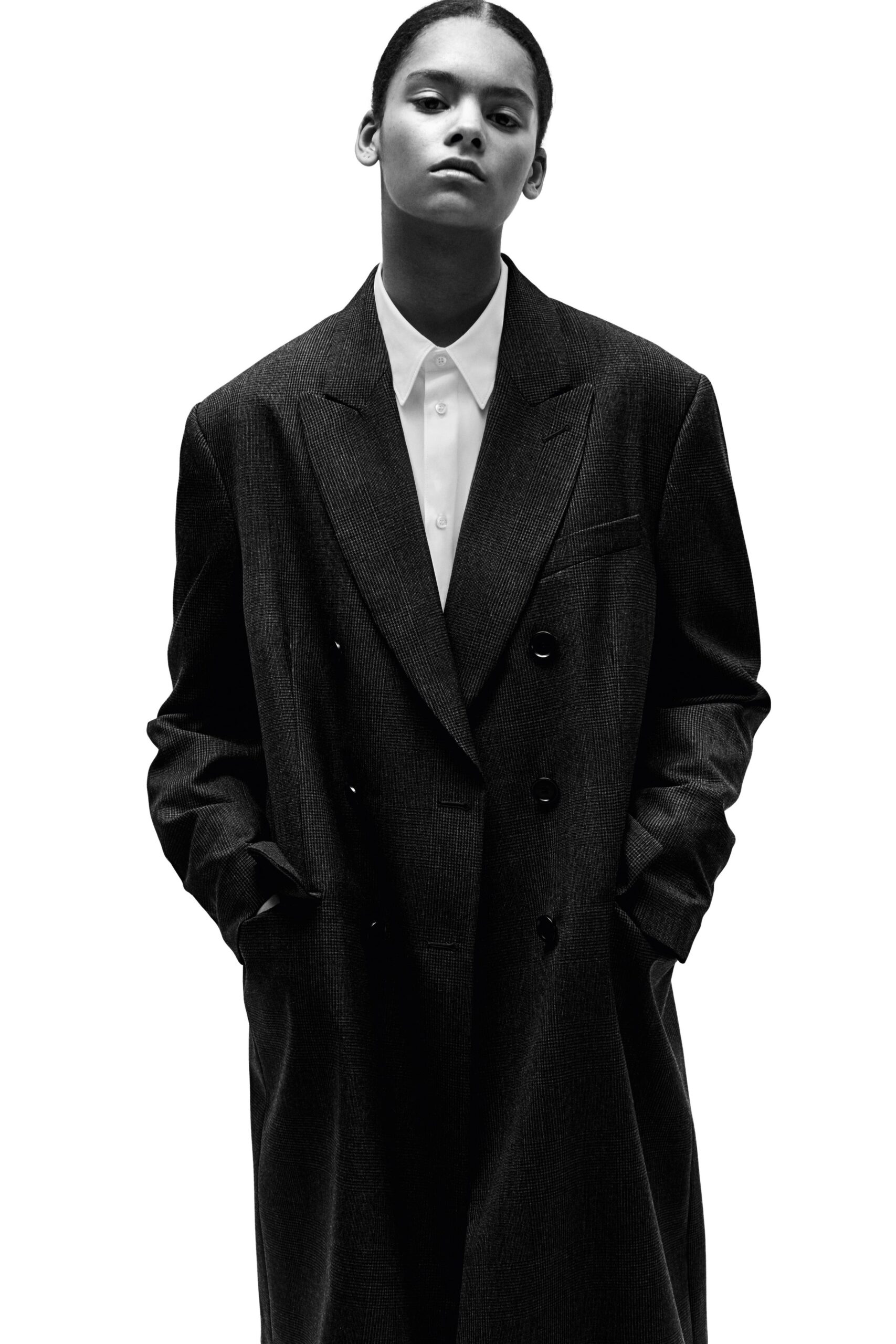 oversized black coat and white shirt