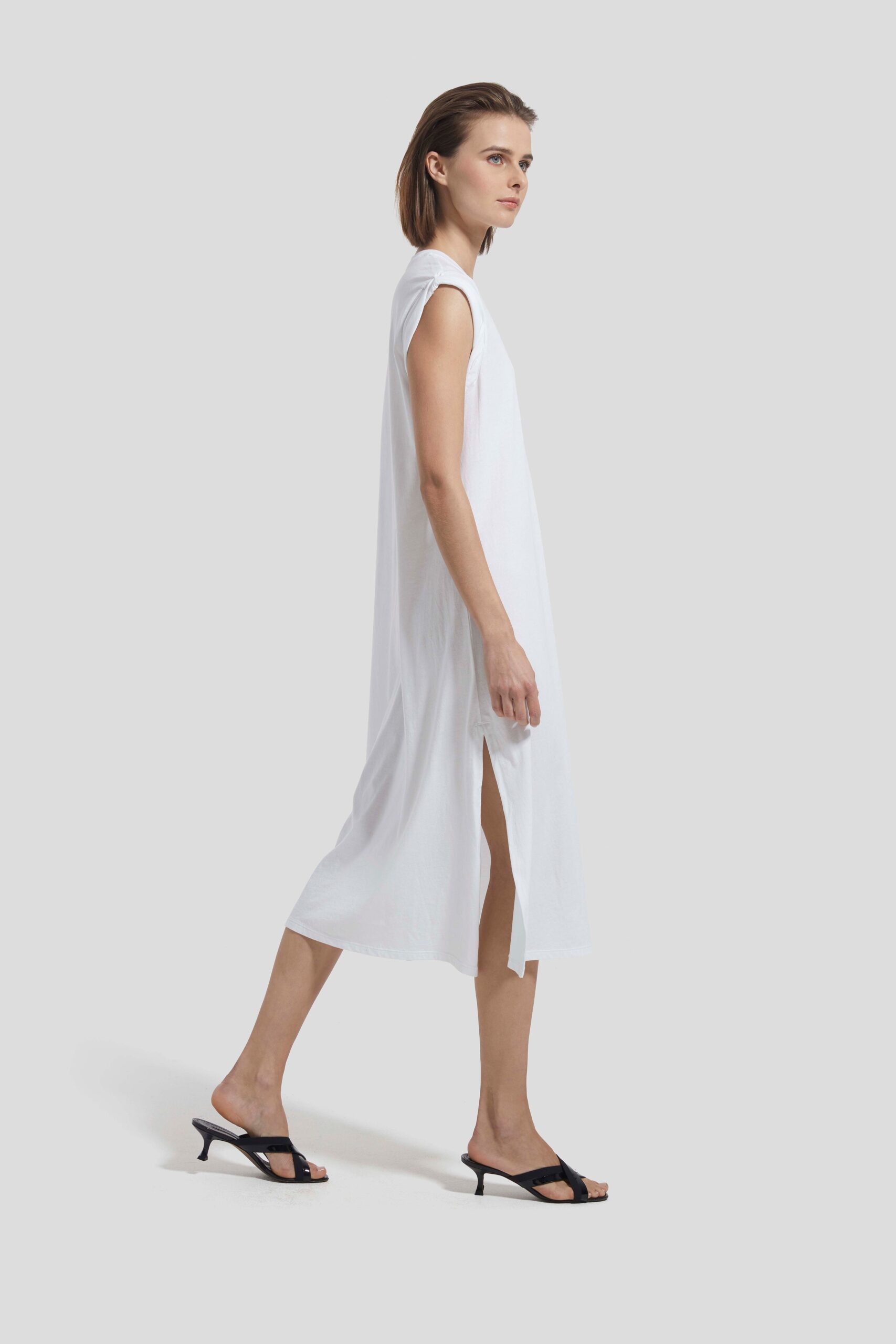 white relaxed midi dress with black shoes