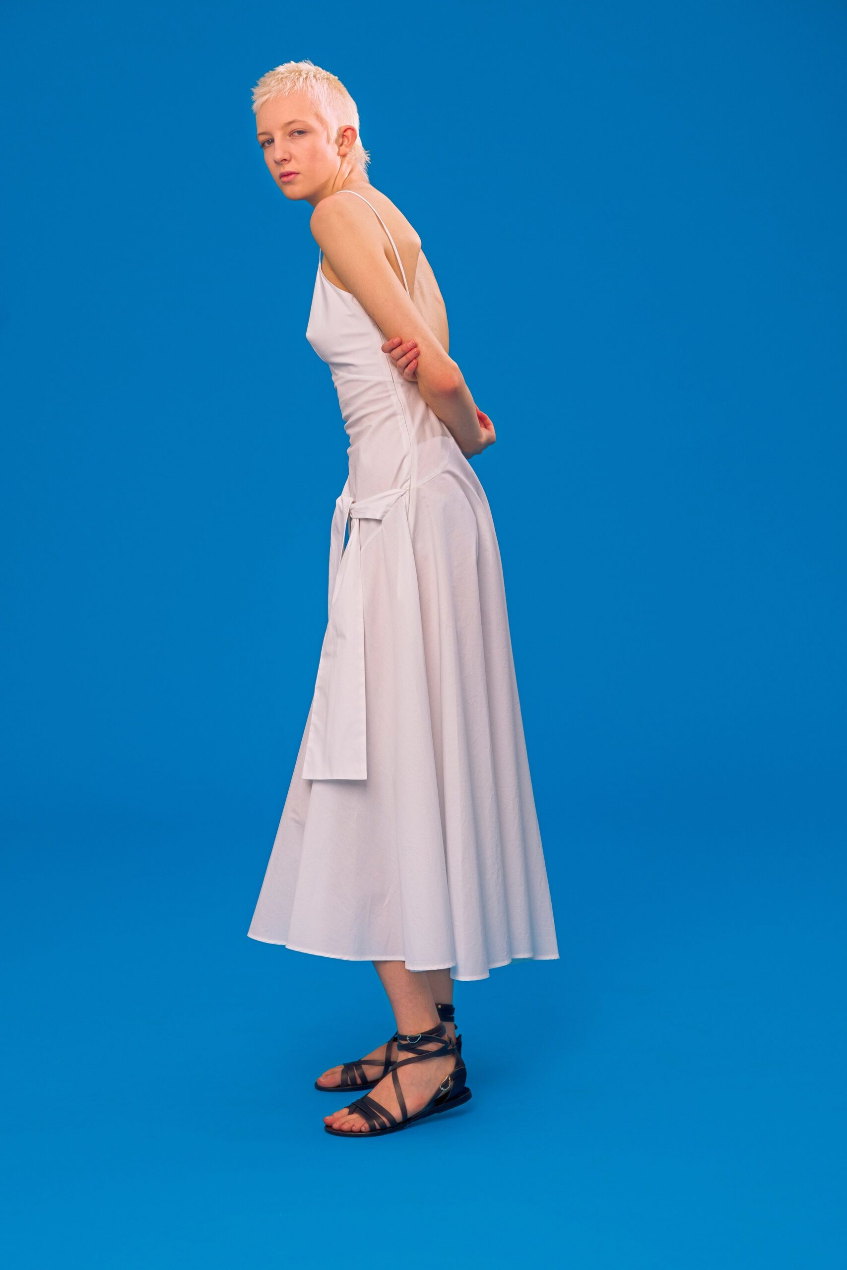 white fitted midi dress