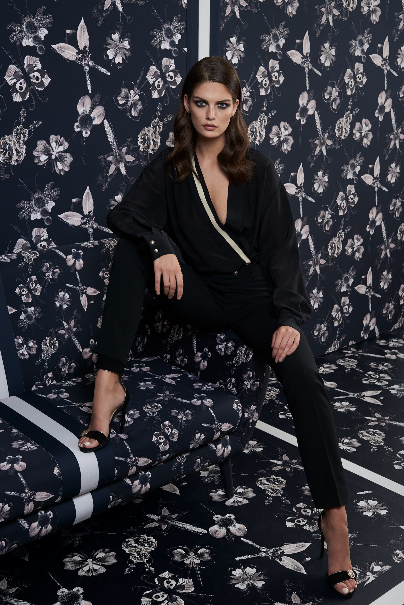 black silk blouse with fitted pants