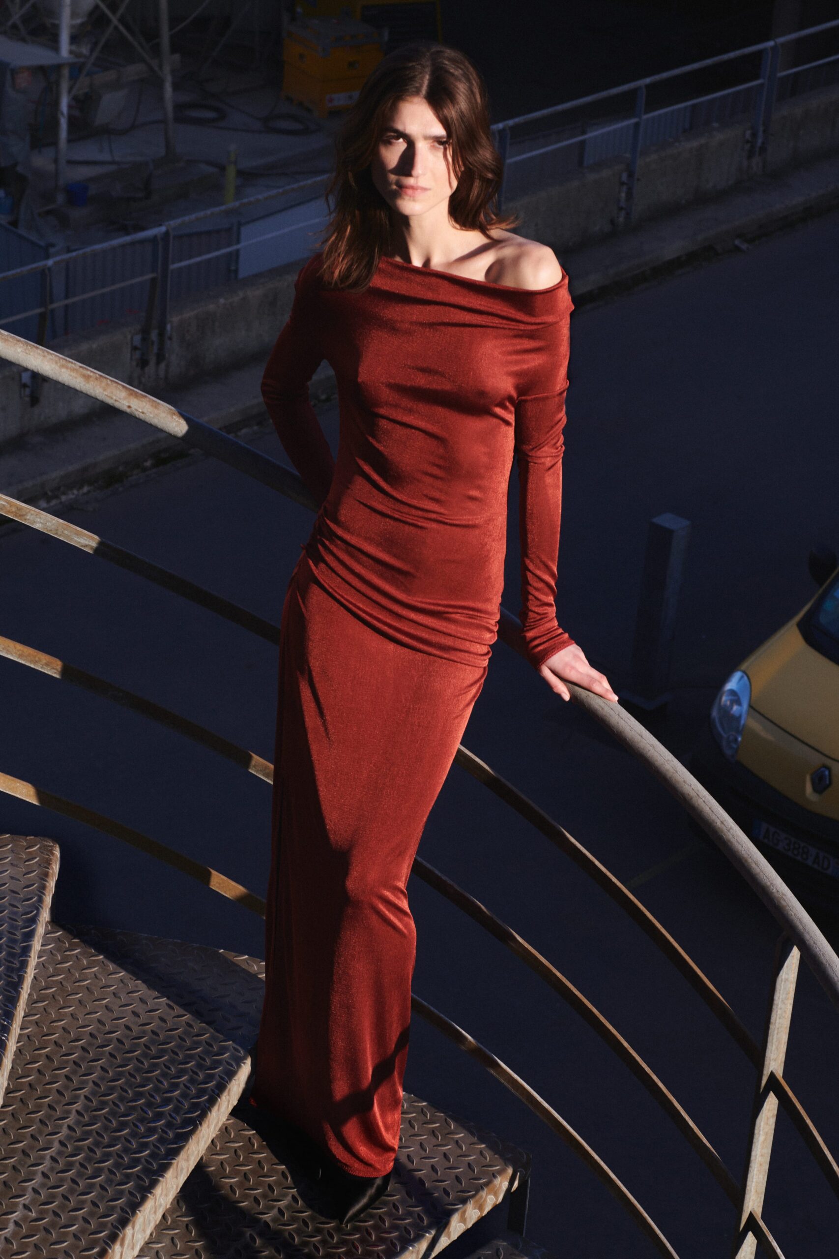 fitted red velvet off-shoulder gown