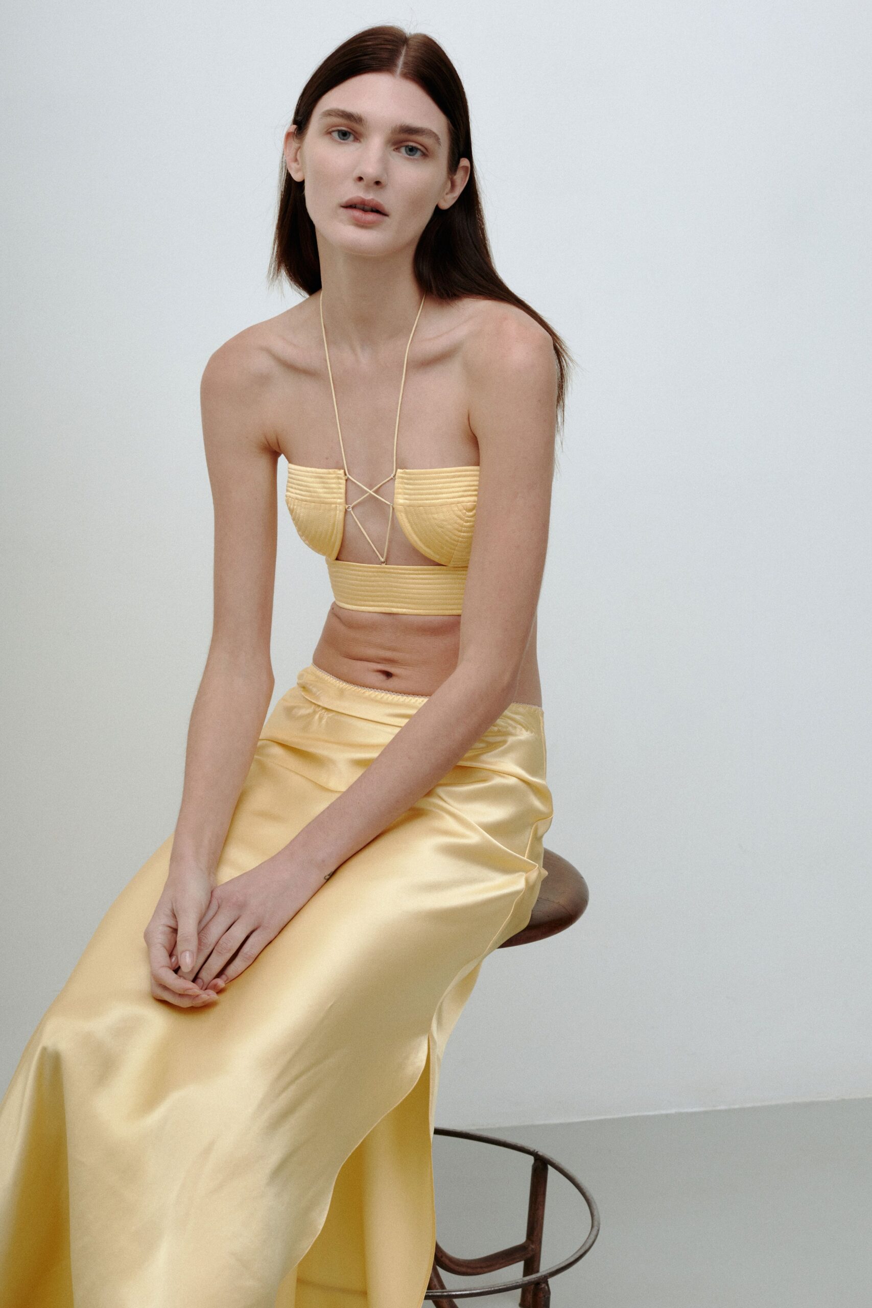 yellow silk sleeveless strapless fitted ruched shiny top