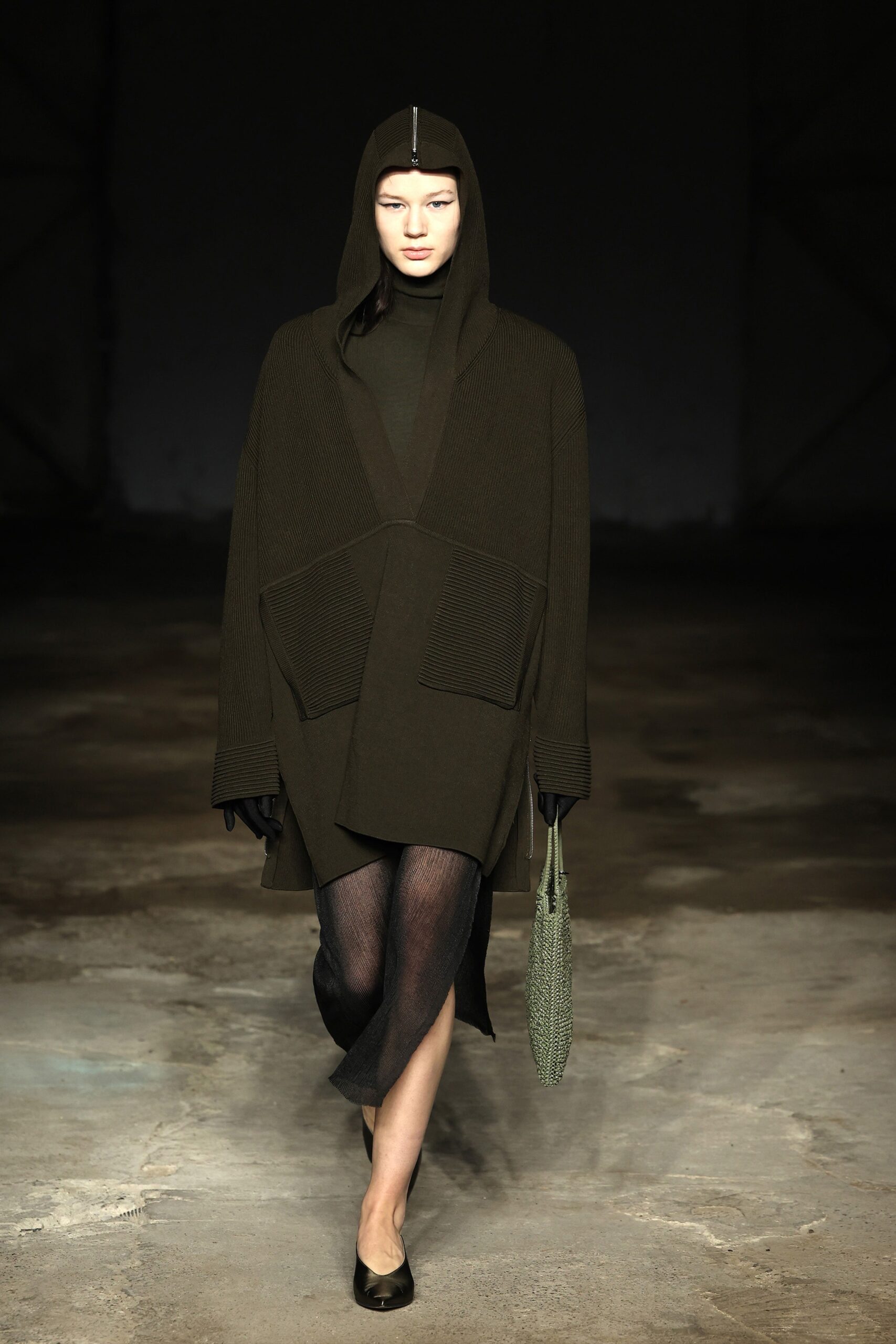 green wool coat with black dress