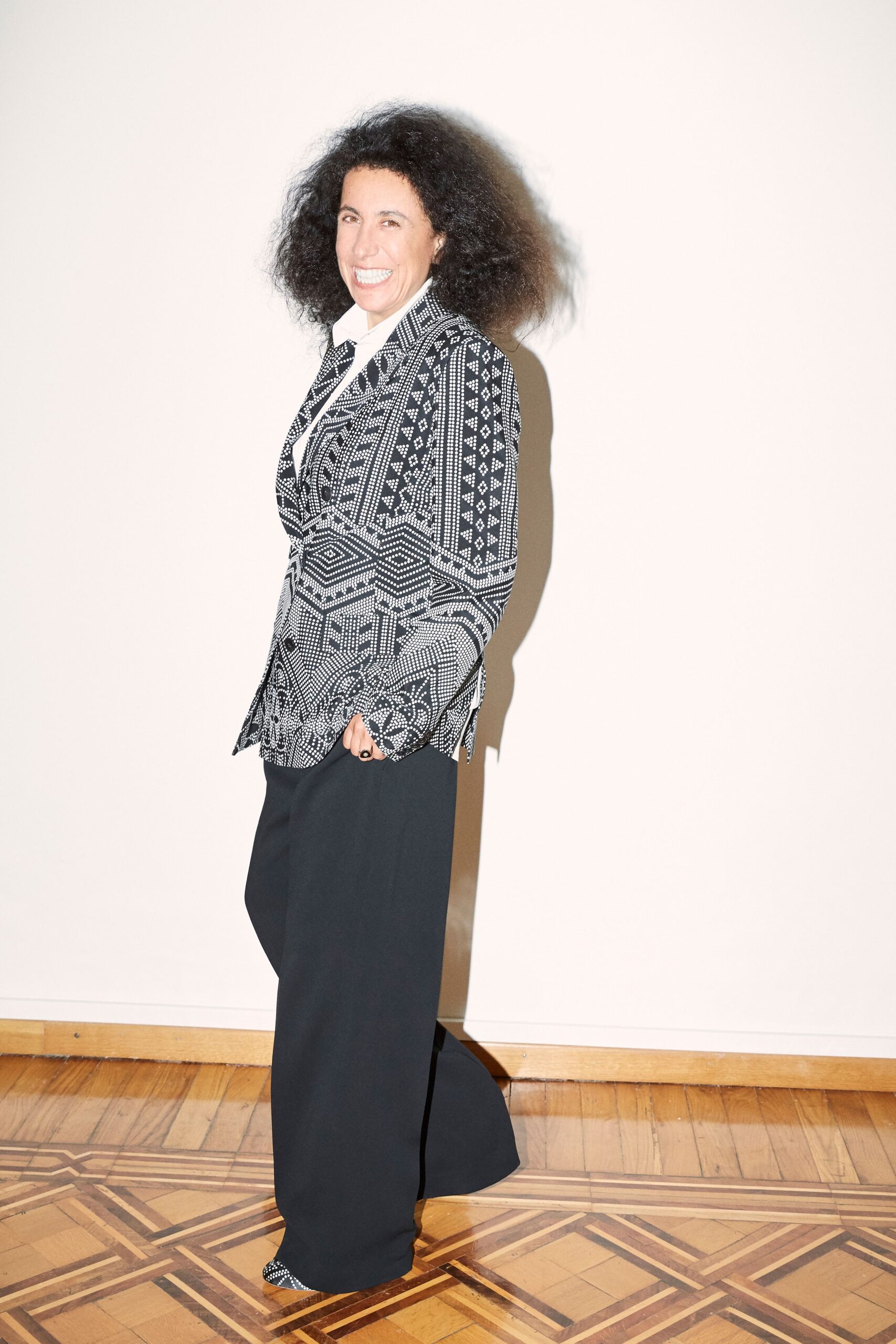 black and white printed blazer with relaxed pants