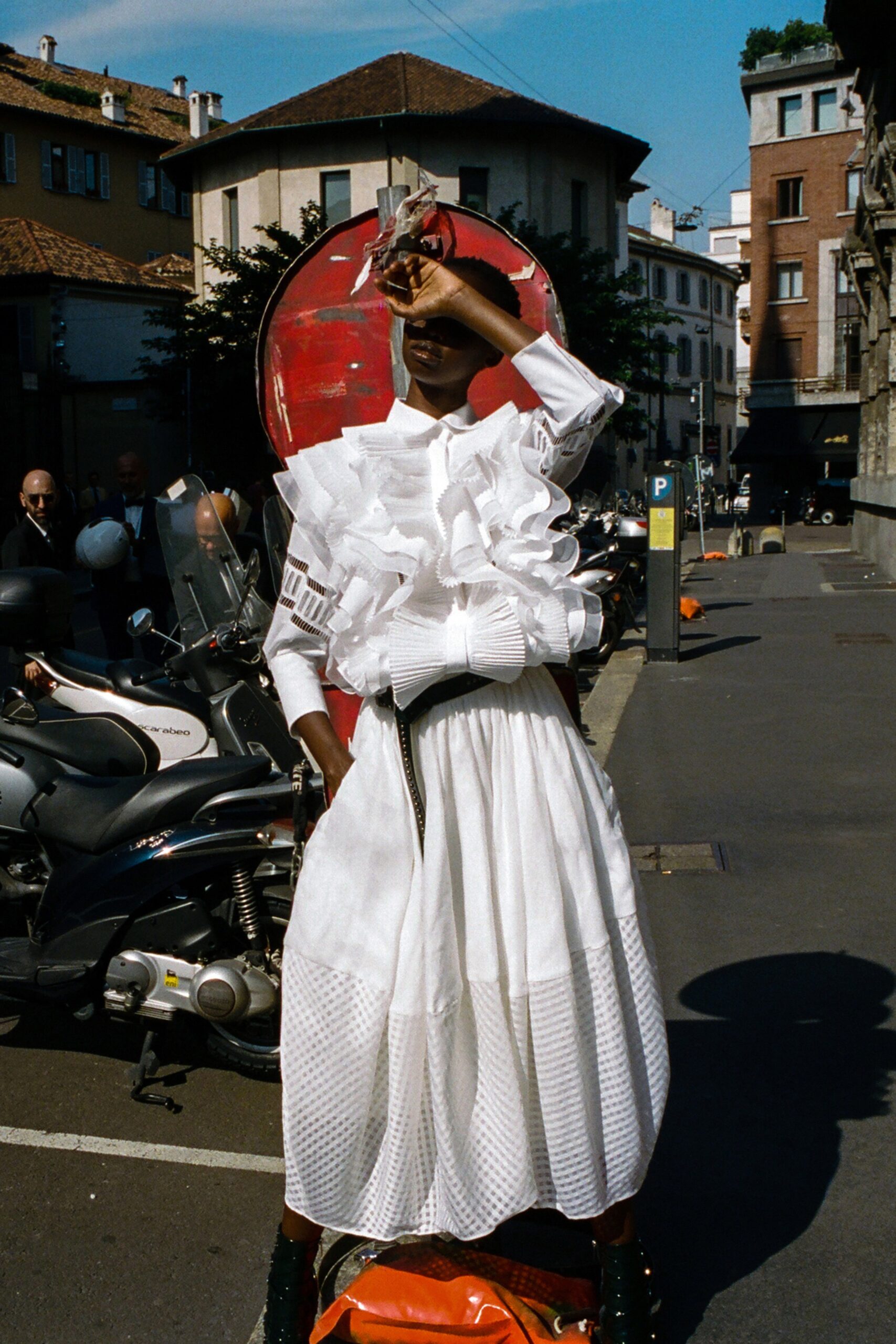 white pleated top and midi skirt