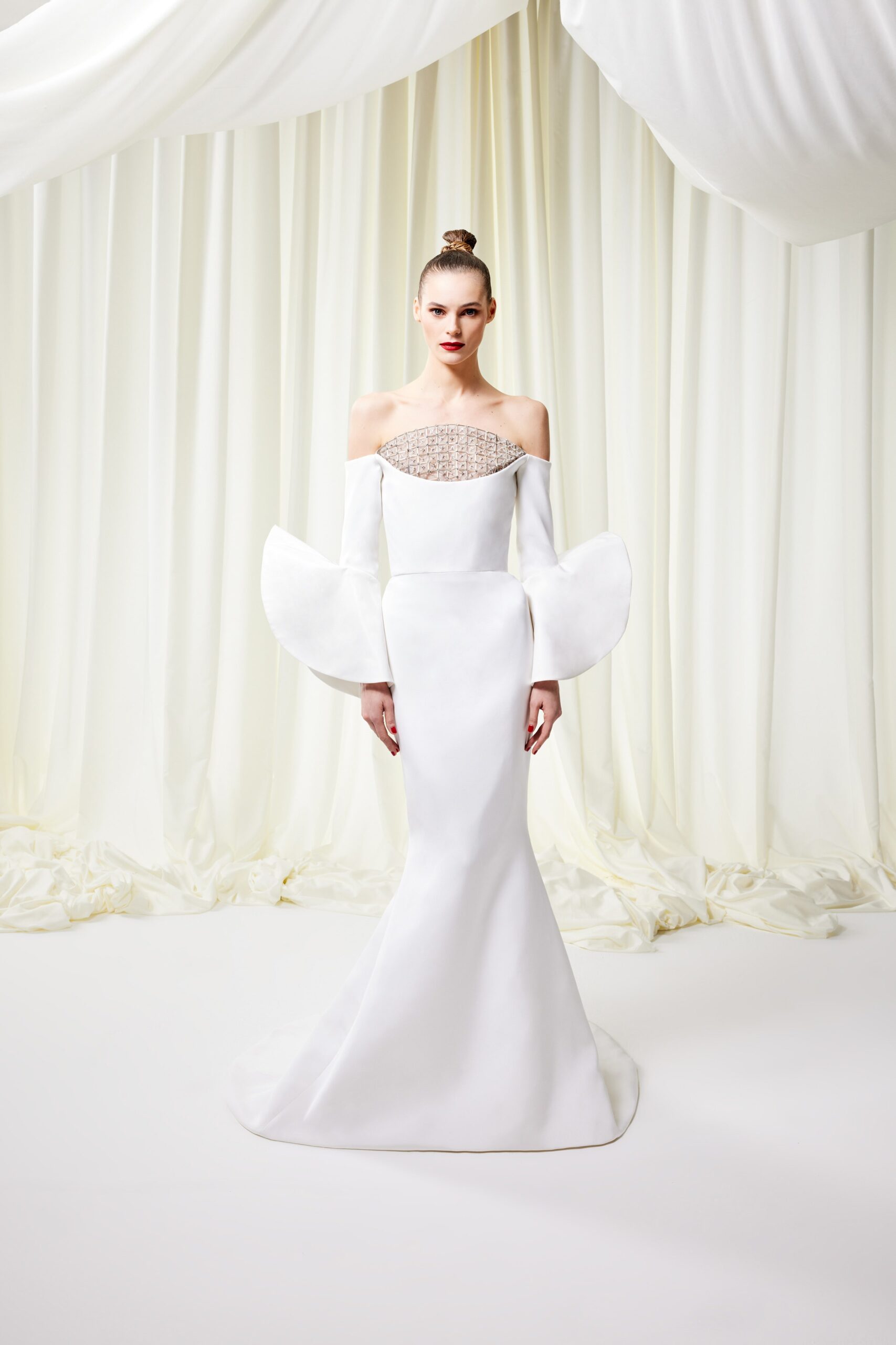 white silk off-shoulder gown