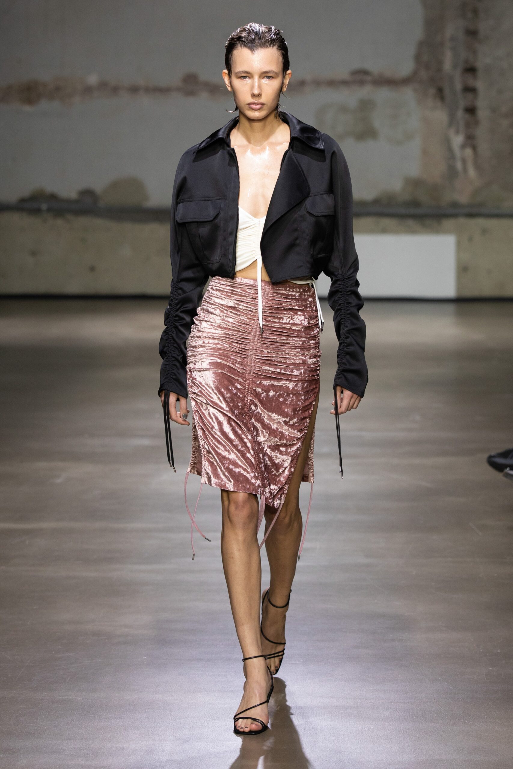 black jacket pink velvet skirt white top
