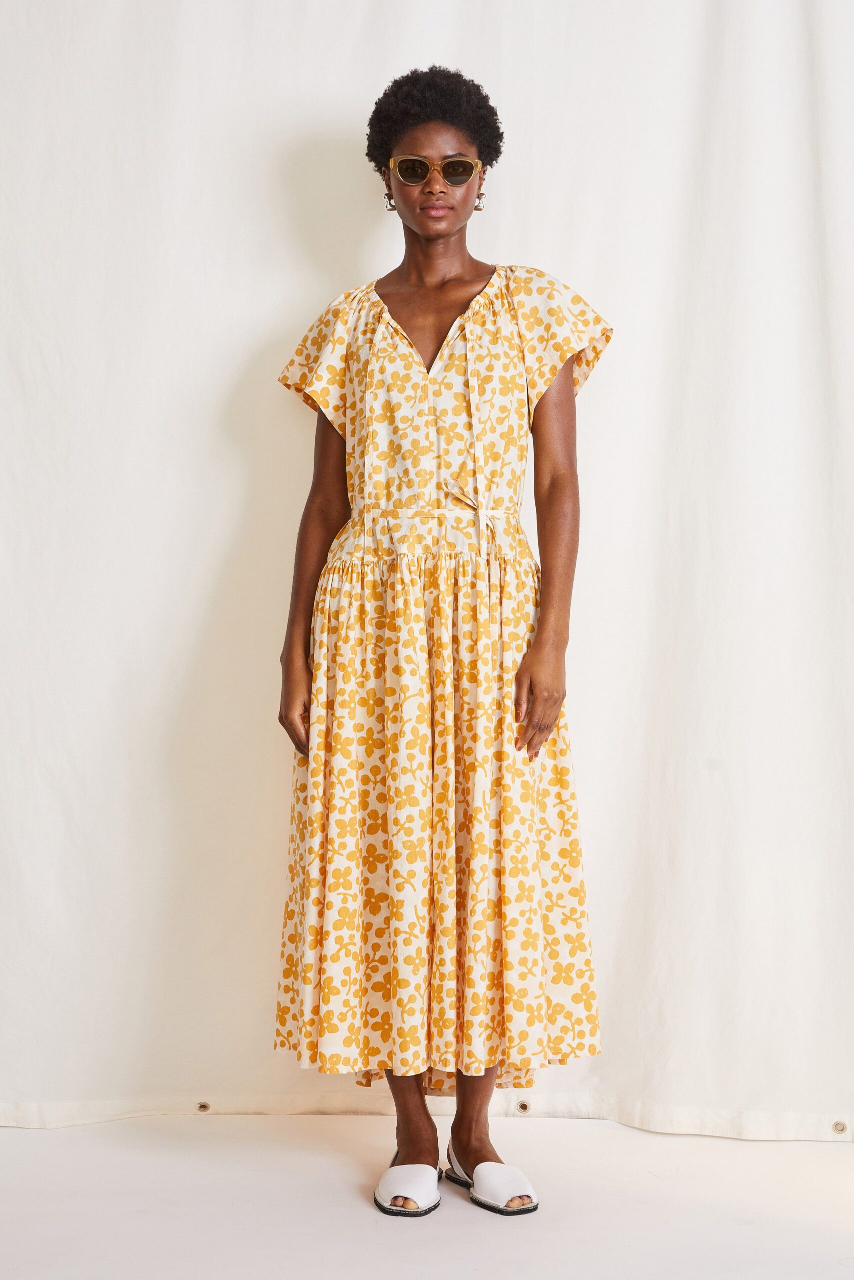 yellow and white printed midi dress