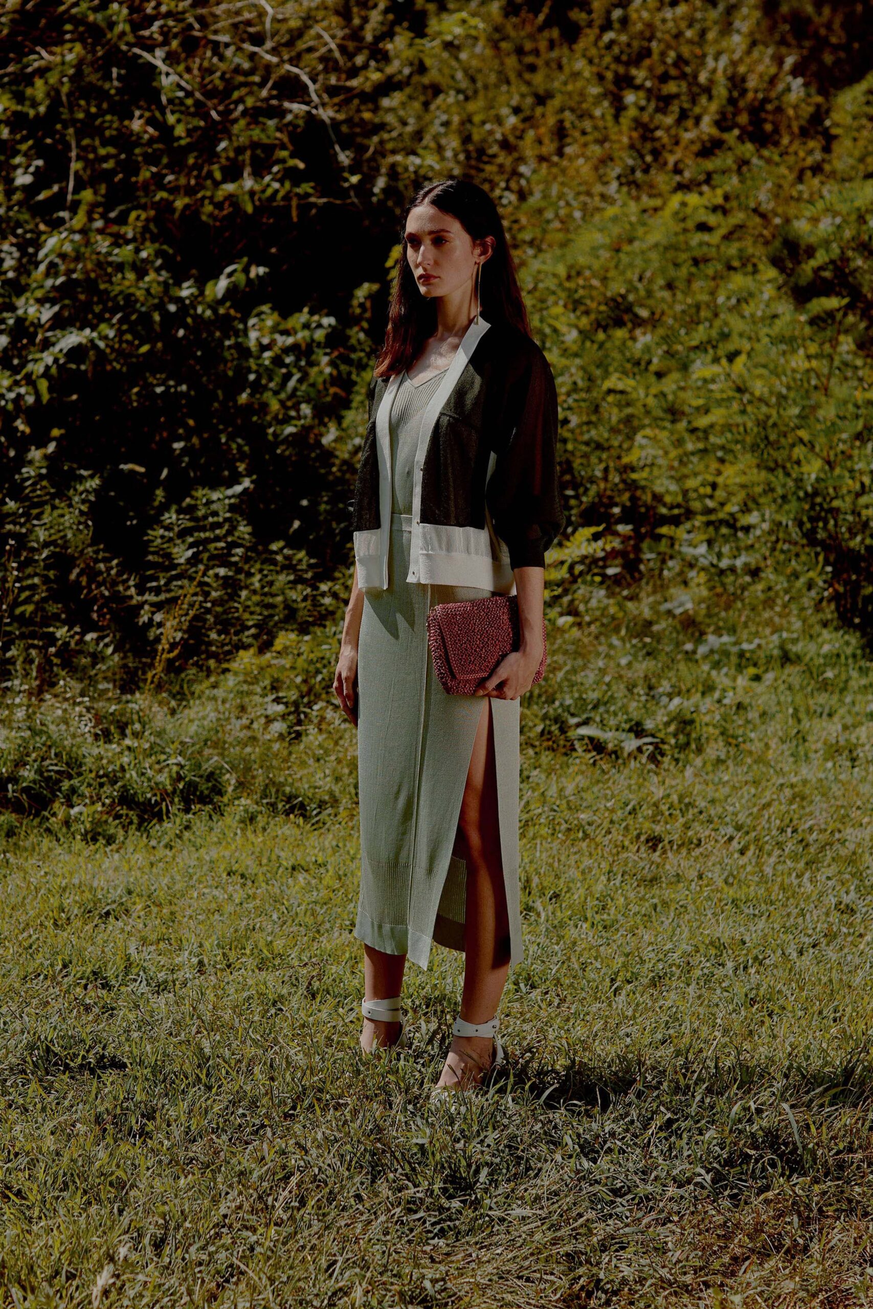 color-blocked midi dress with beaded bag