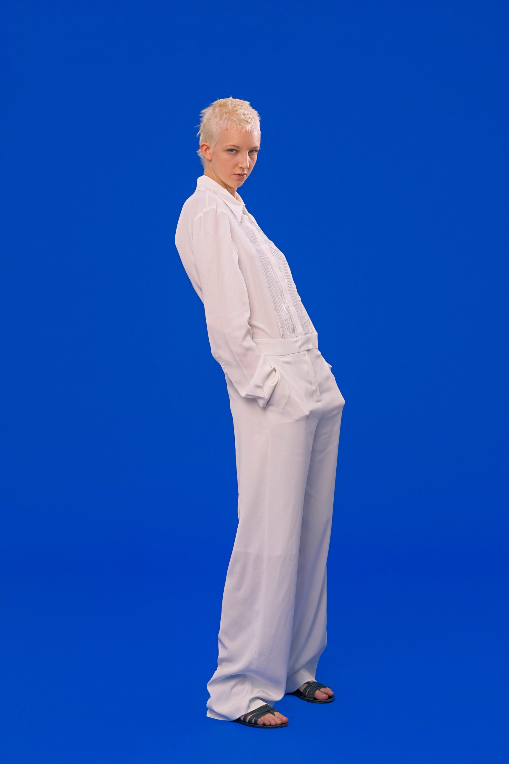 white relaxed shirt and pants