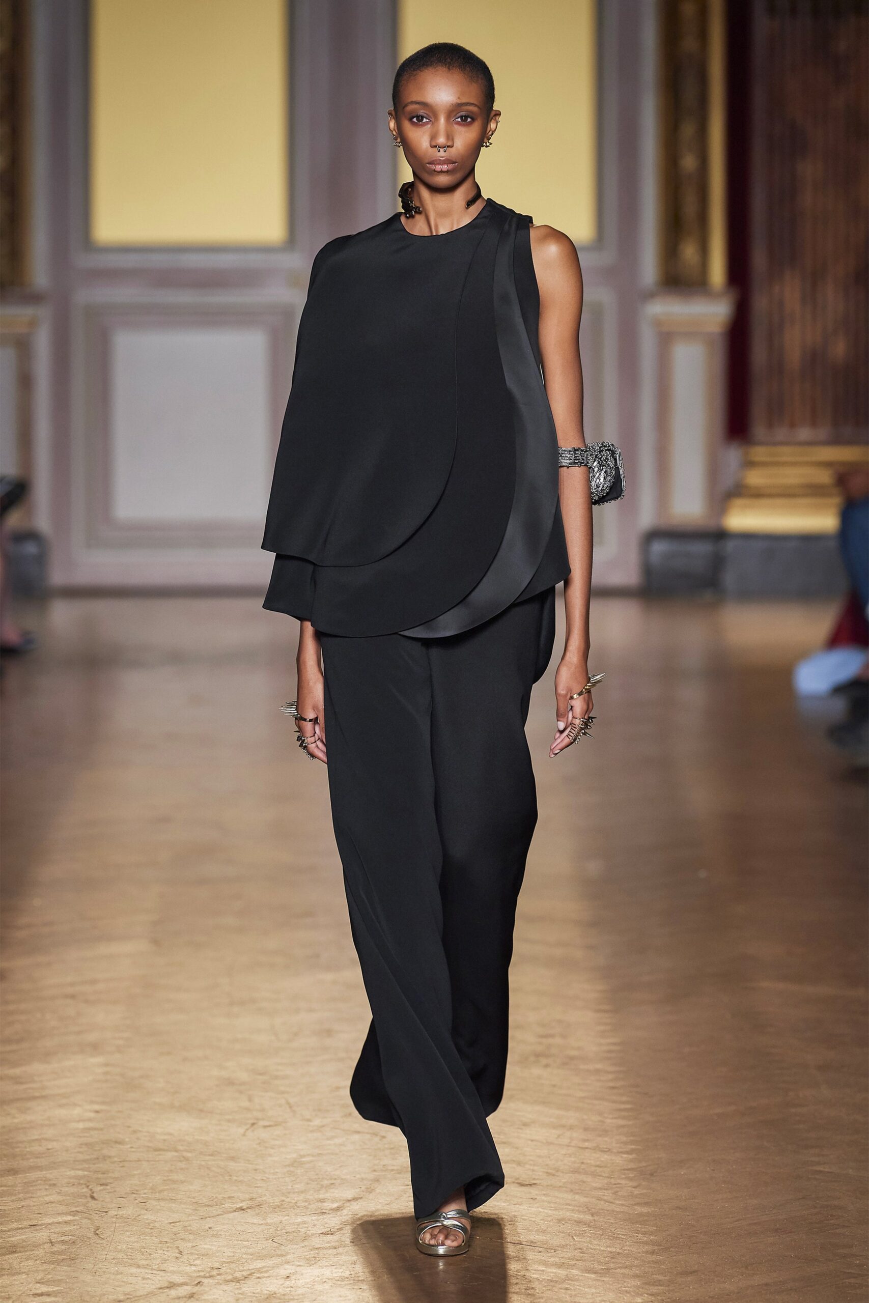 black silk relaxed top and fitted pants