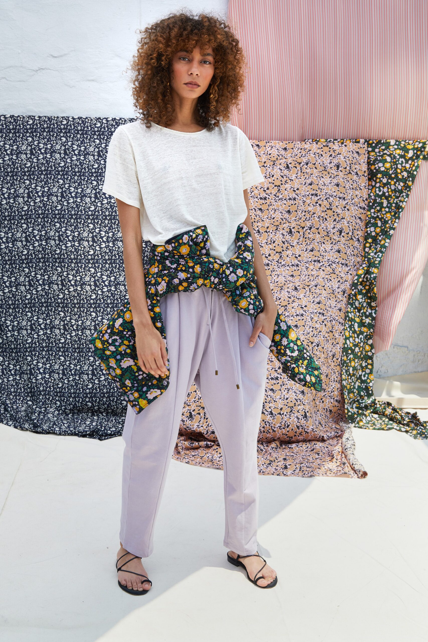 white relaxed cotton top with lavender pants