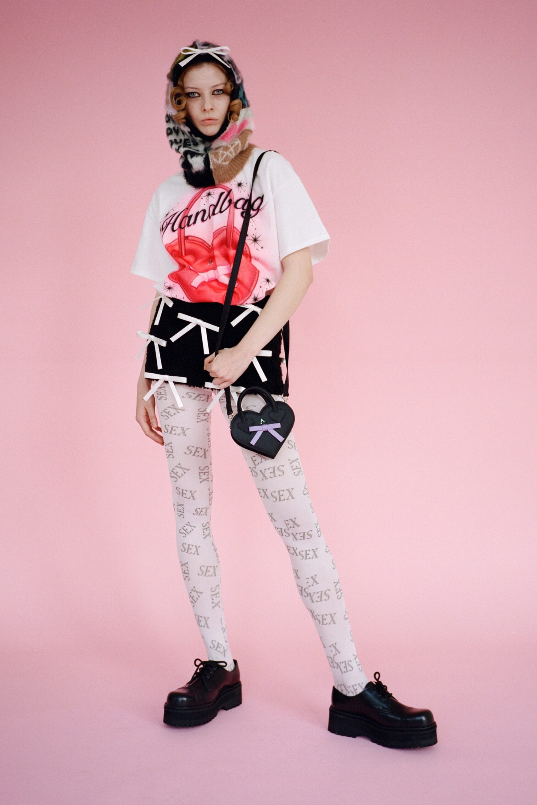 white printed t-shirt black skirt