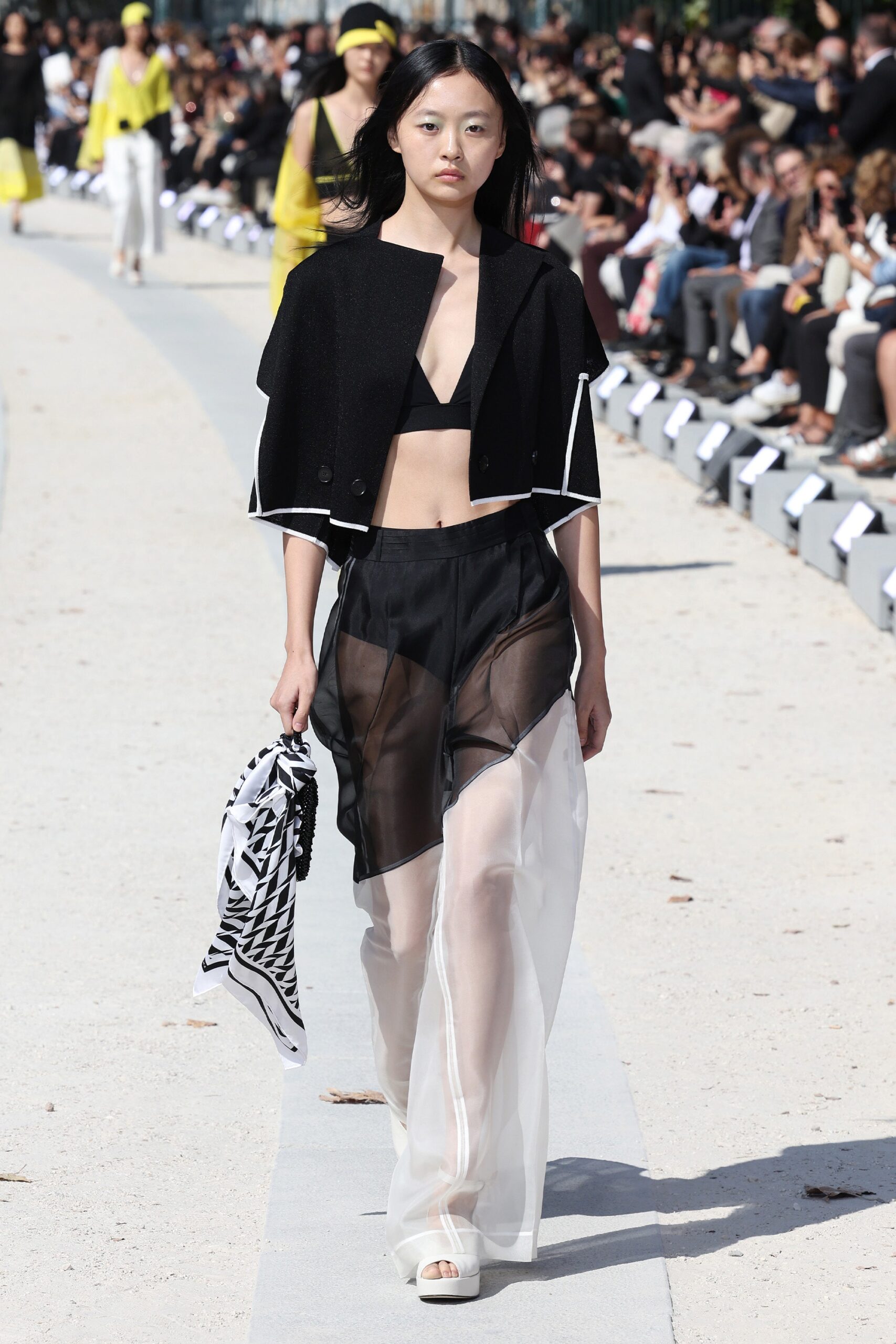 black top and white skirt