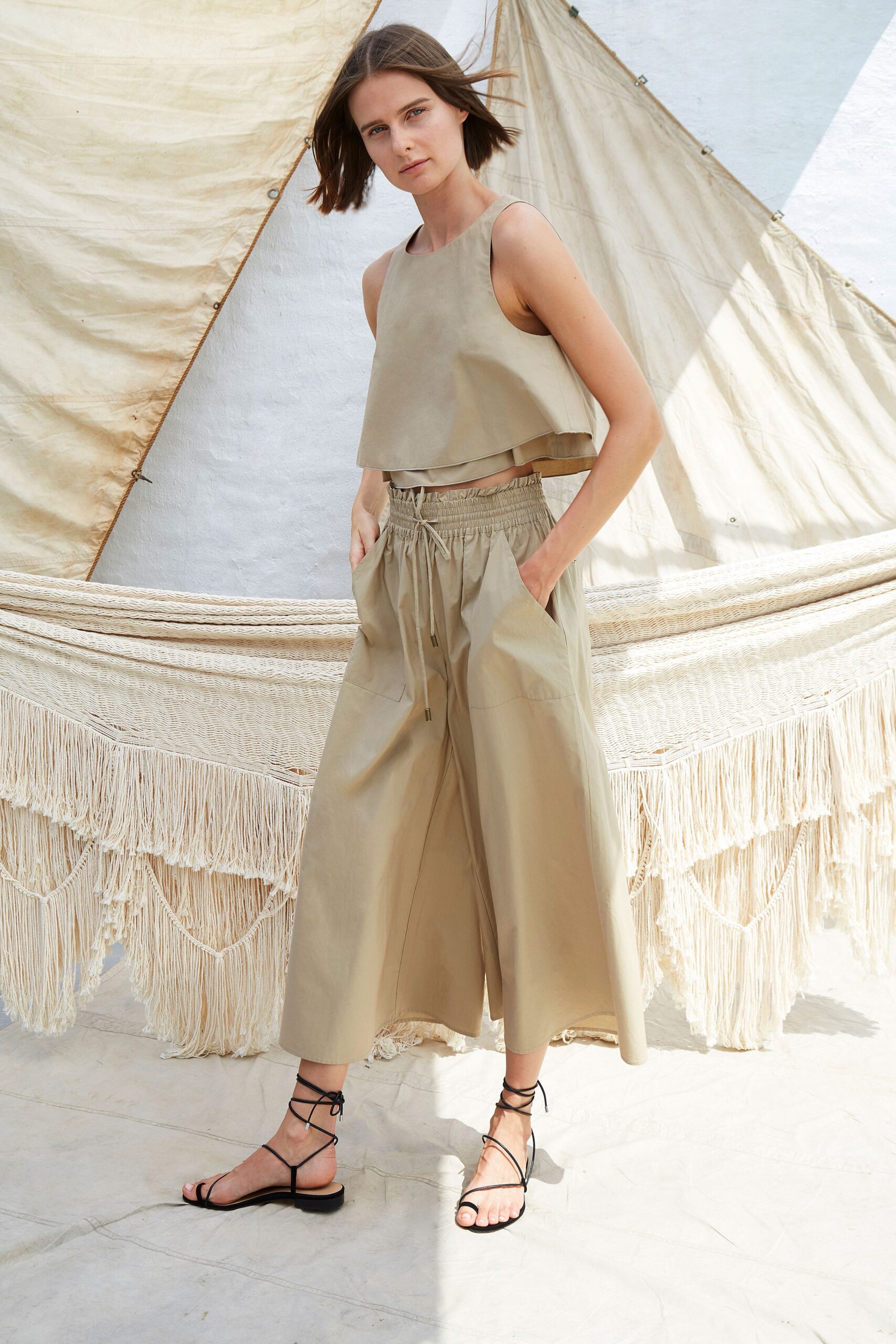 beige cotton cropped top and culottes