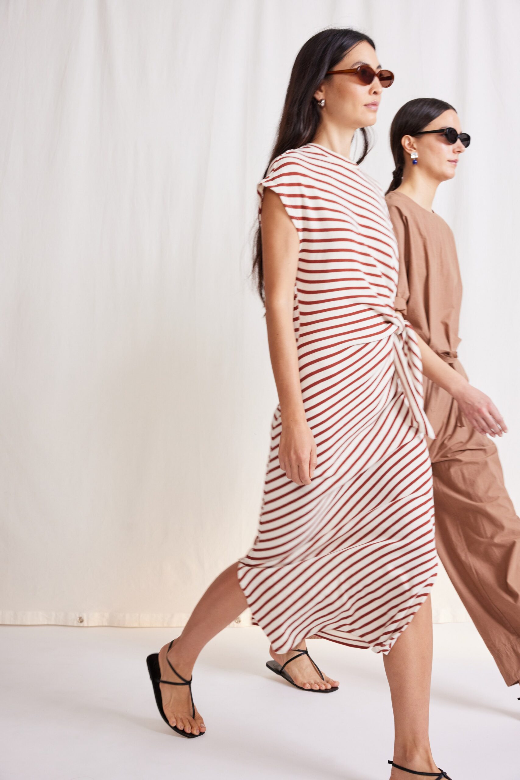 striped midi dress and brown jumpsuit