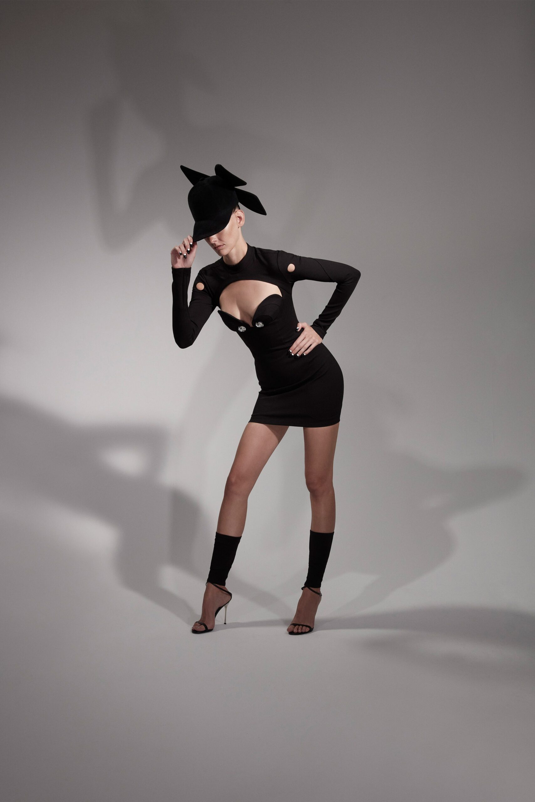 black fitted mini dress with cutouts