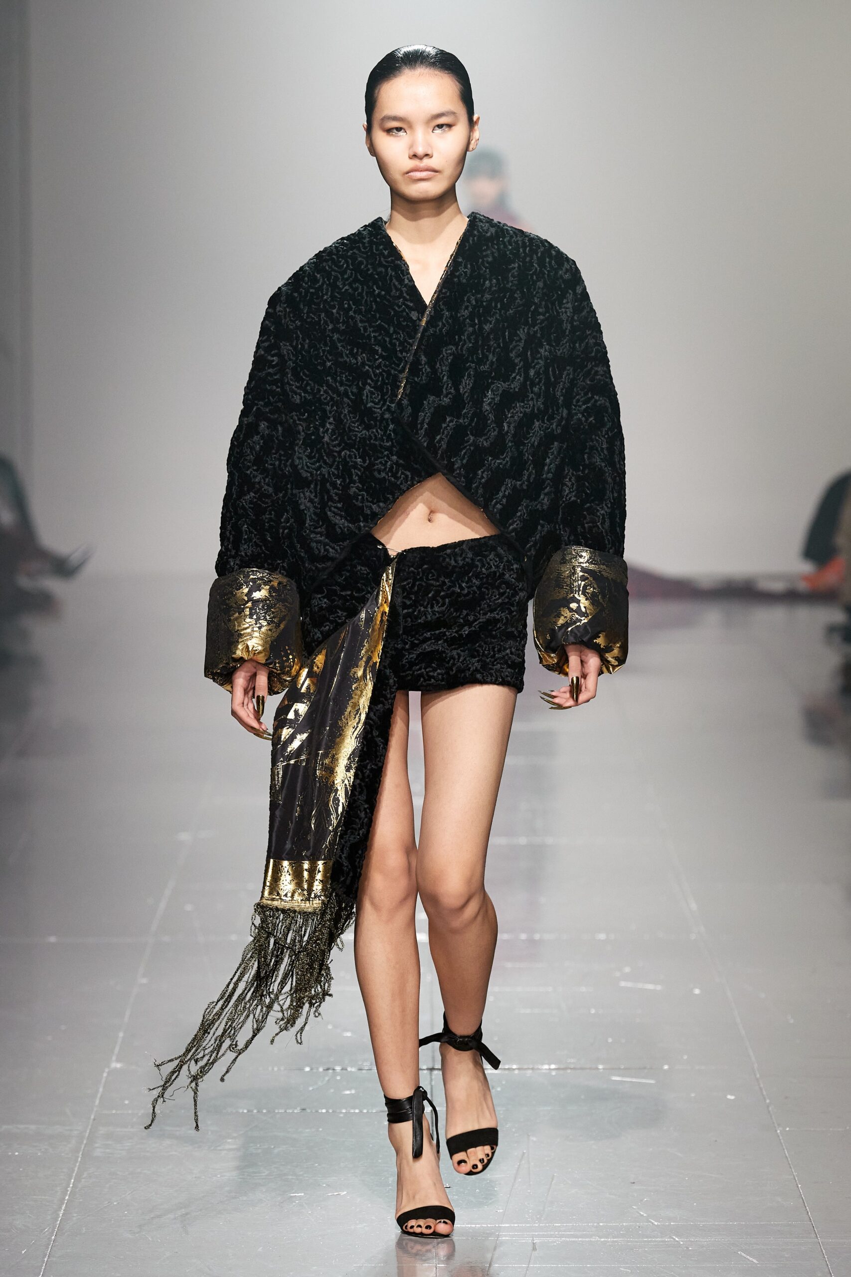 black silk asymmetric top and skirt