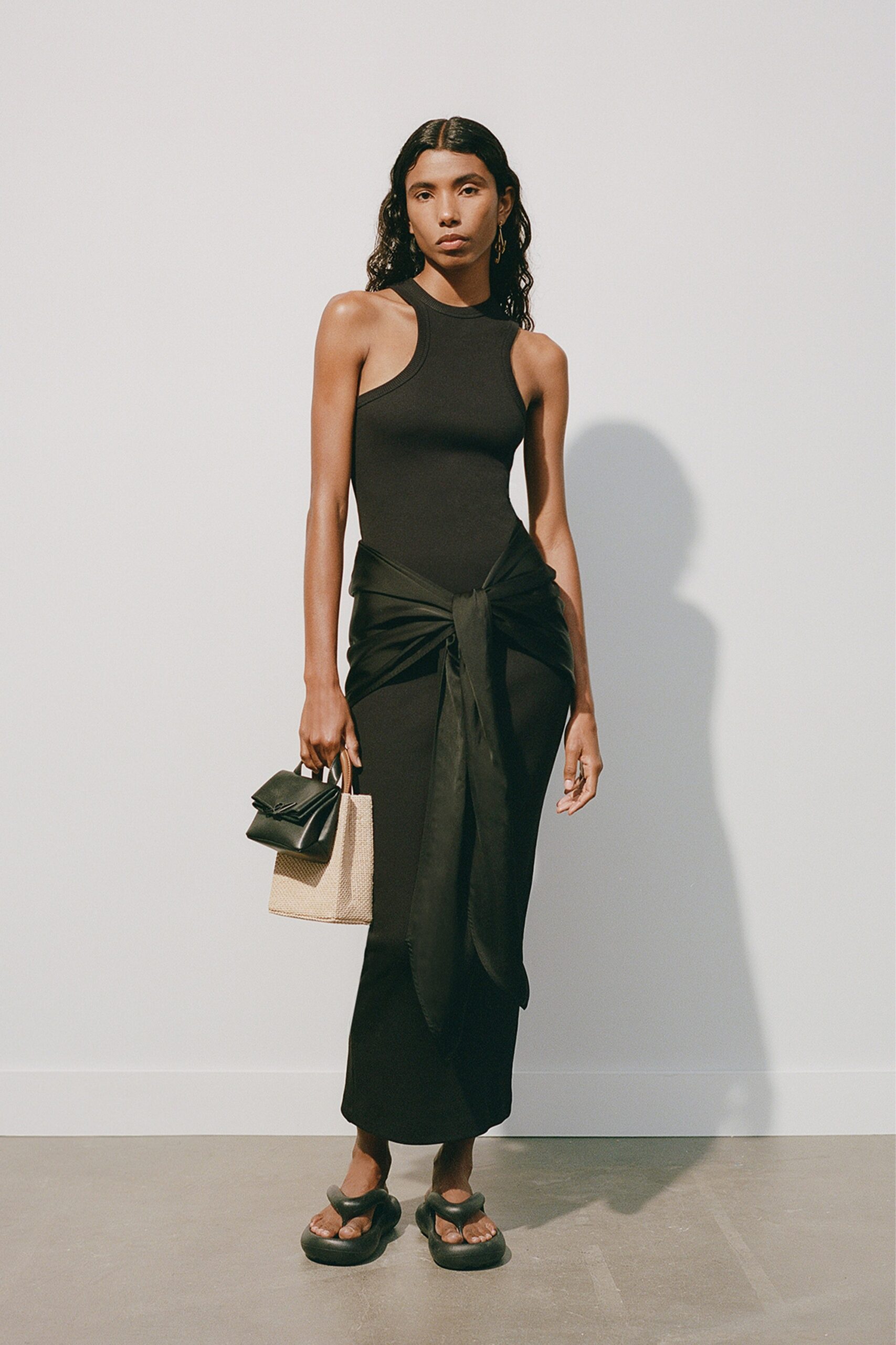 black fitted sleeveless dress