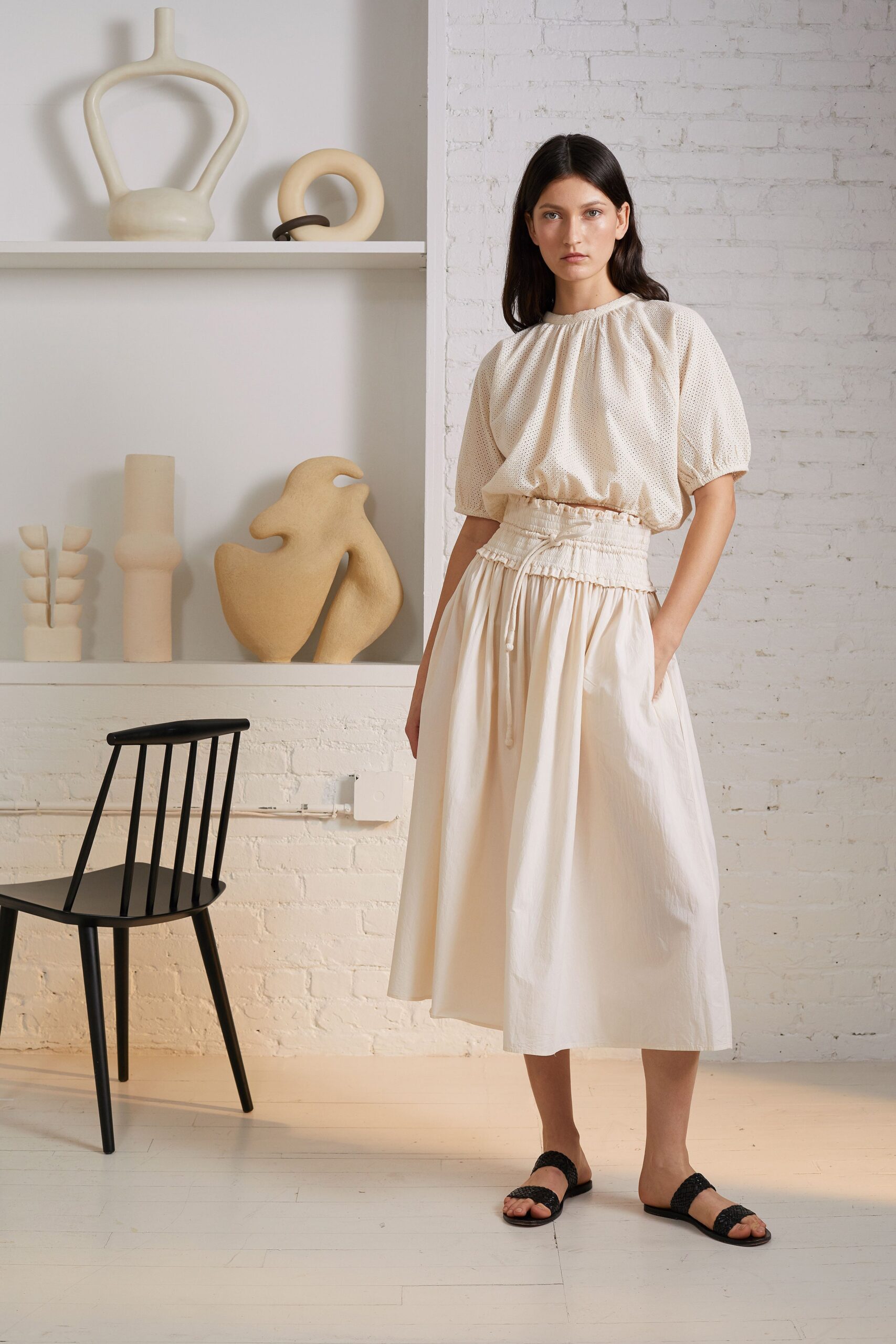 beige relaxed top and midi skirt