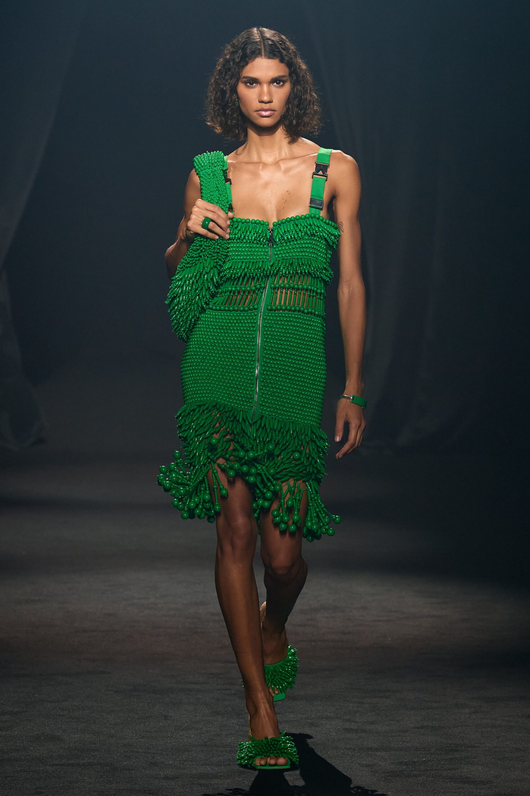 green cotton sleeveless v-neck fitted ruffled zippered dress