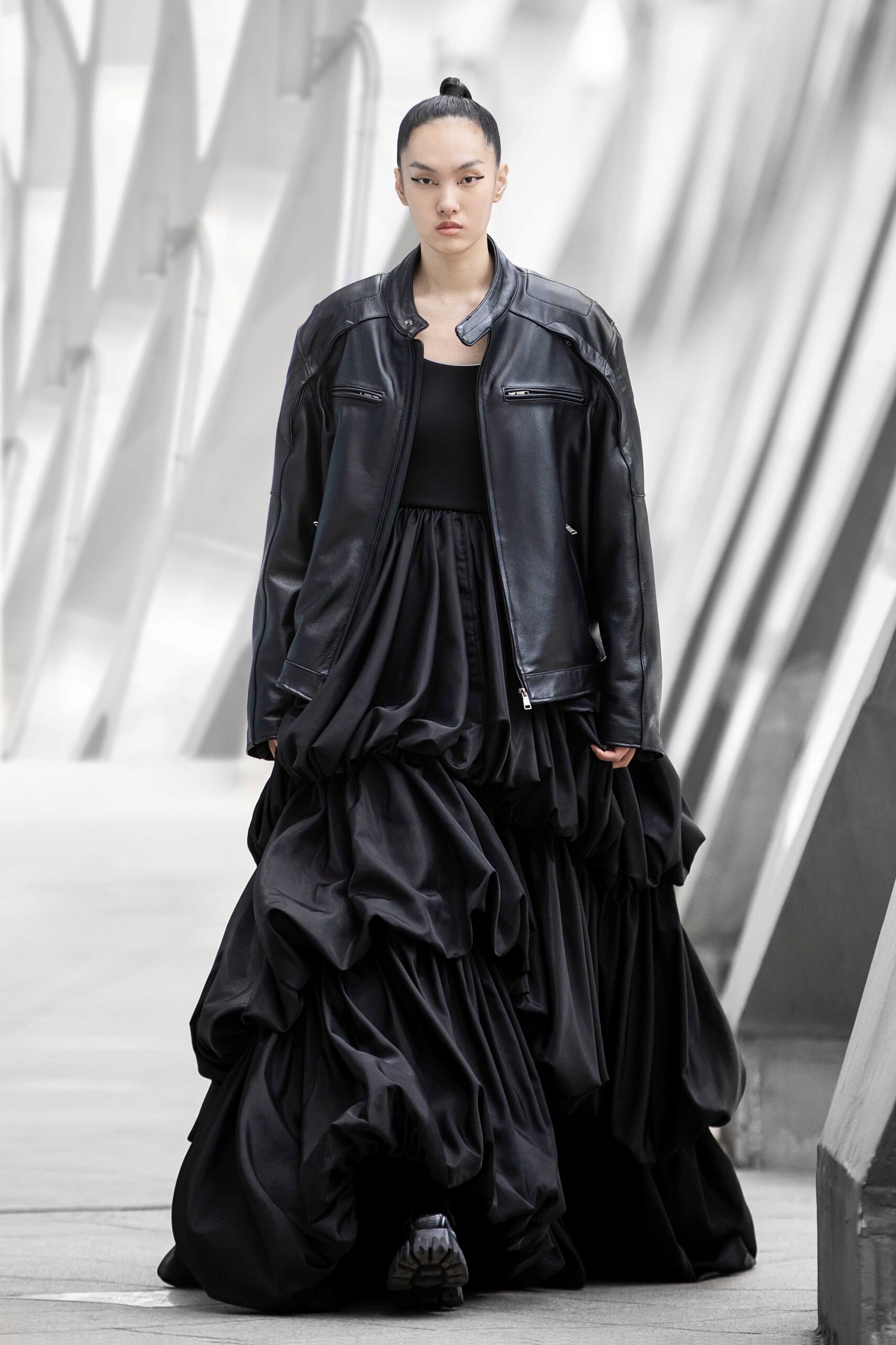 black leather oversized jacket and tiered dress