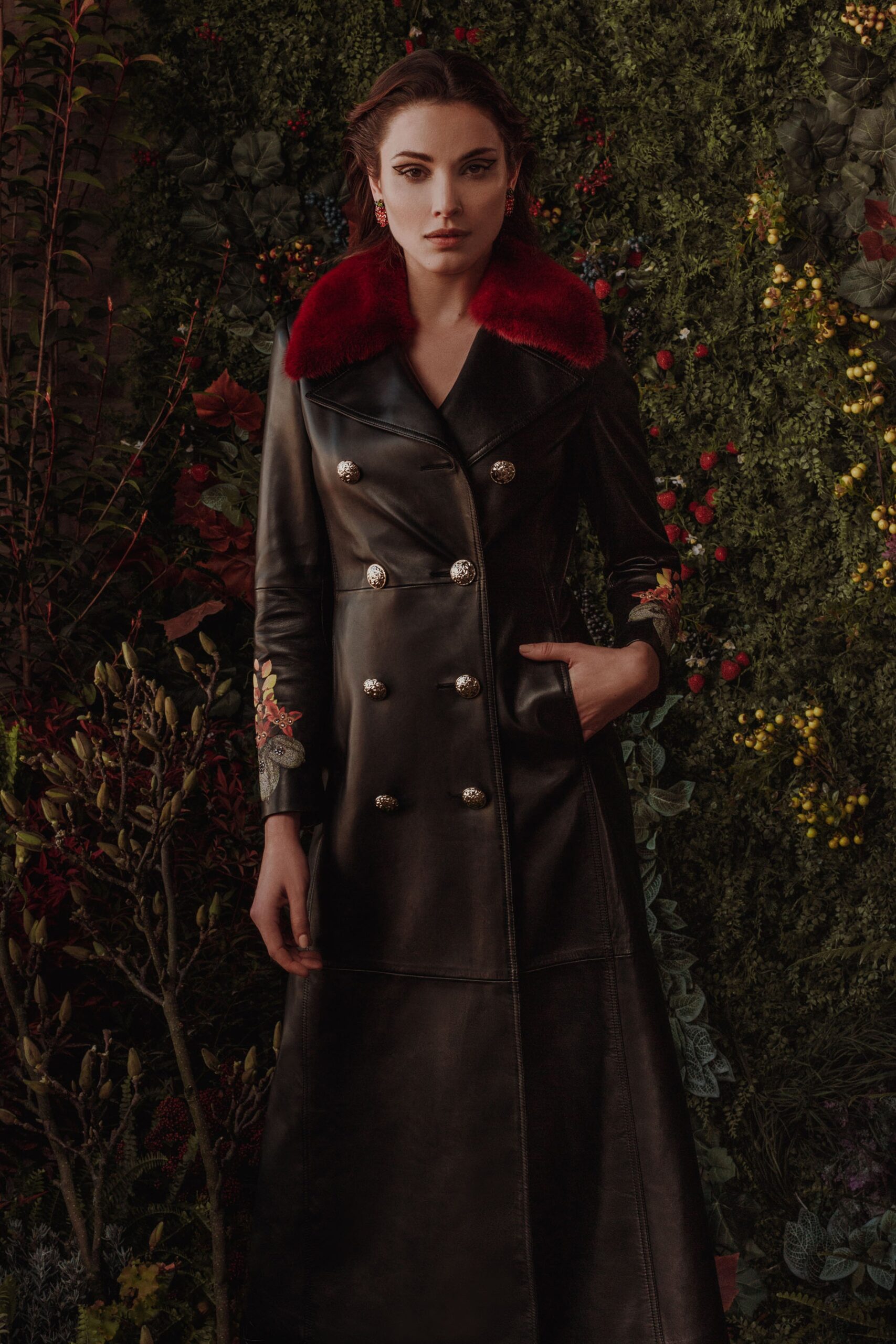 black leather coat with red collar