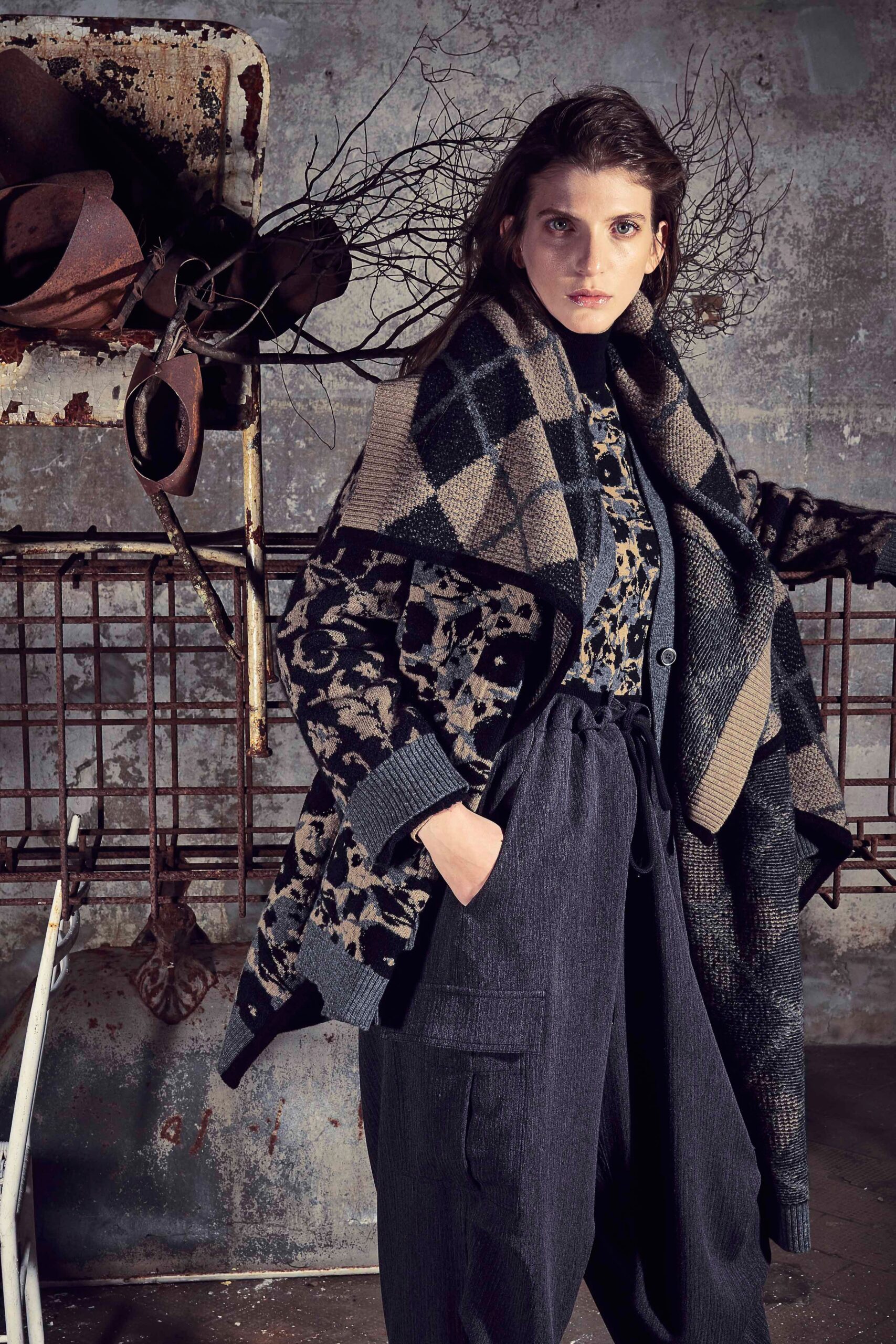 black wool long-sleeve collared relaxed layered printed coat