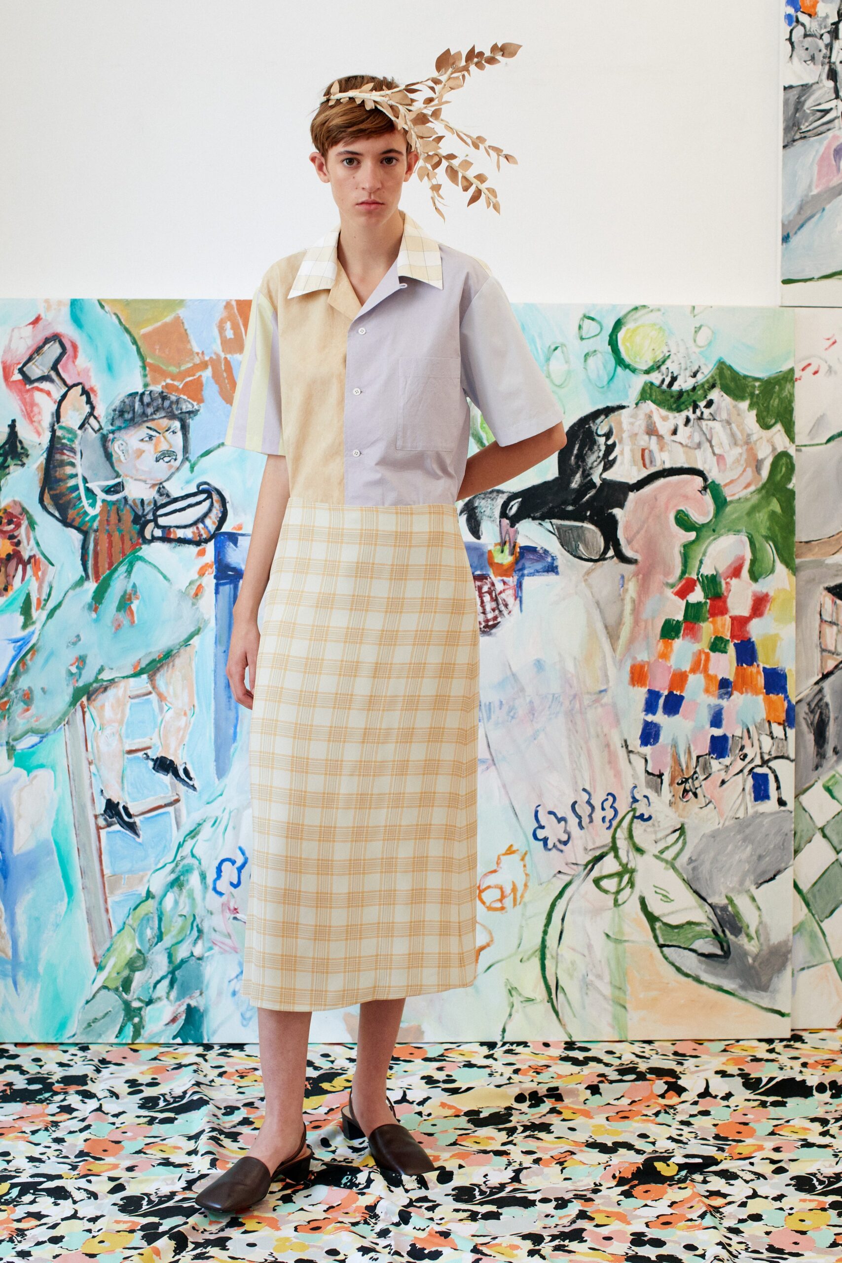 color-blocked shirt and pleated skirt