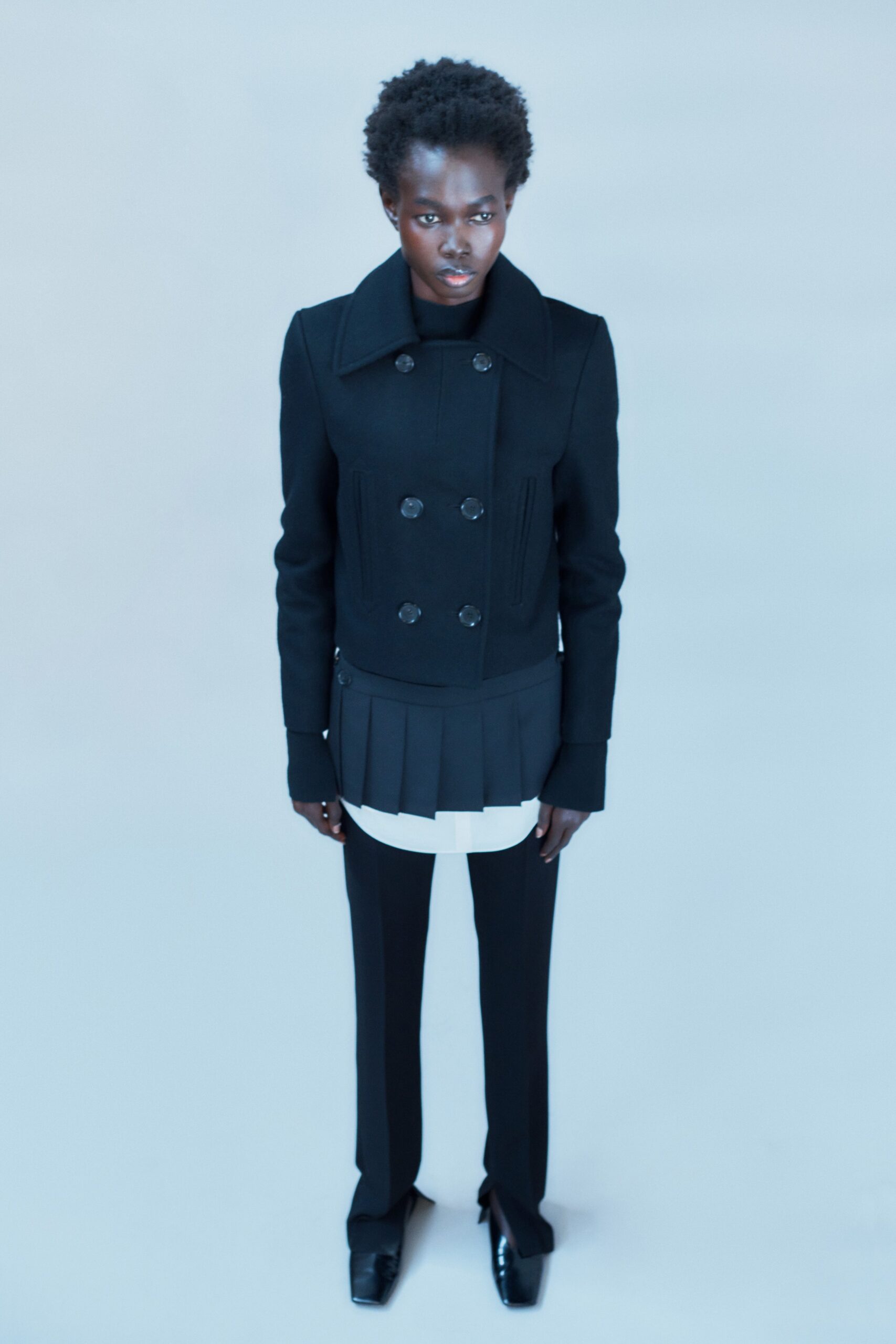 black wool long-sleeve collared fitted buttoned jacket