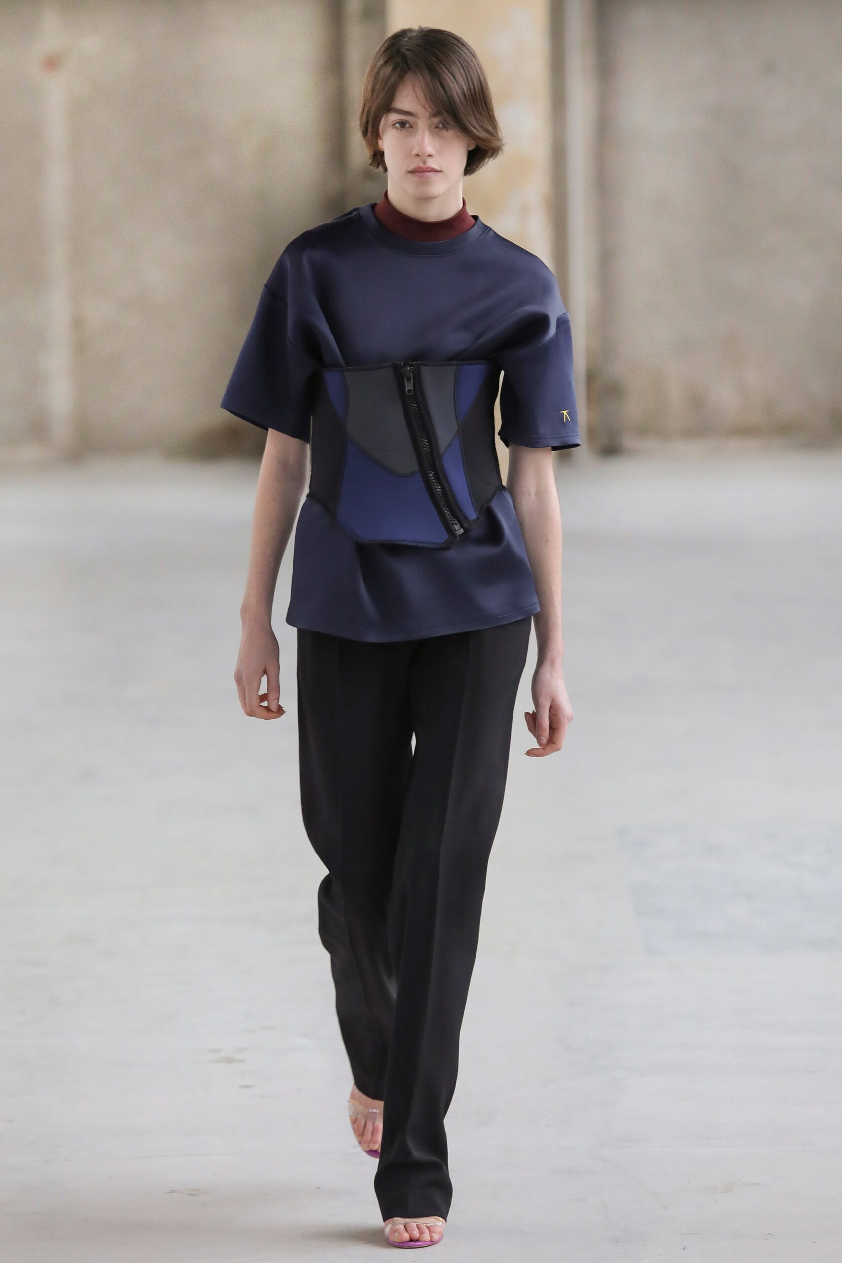 blue neoprene short-sleeve high-neck fitted zippered top