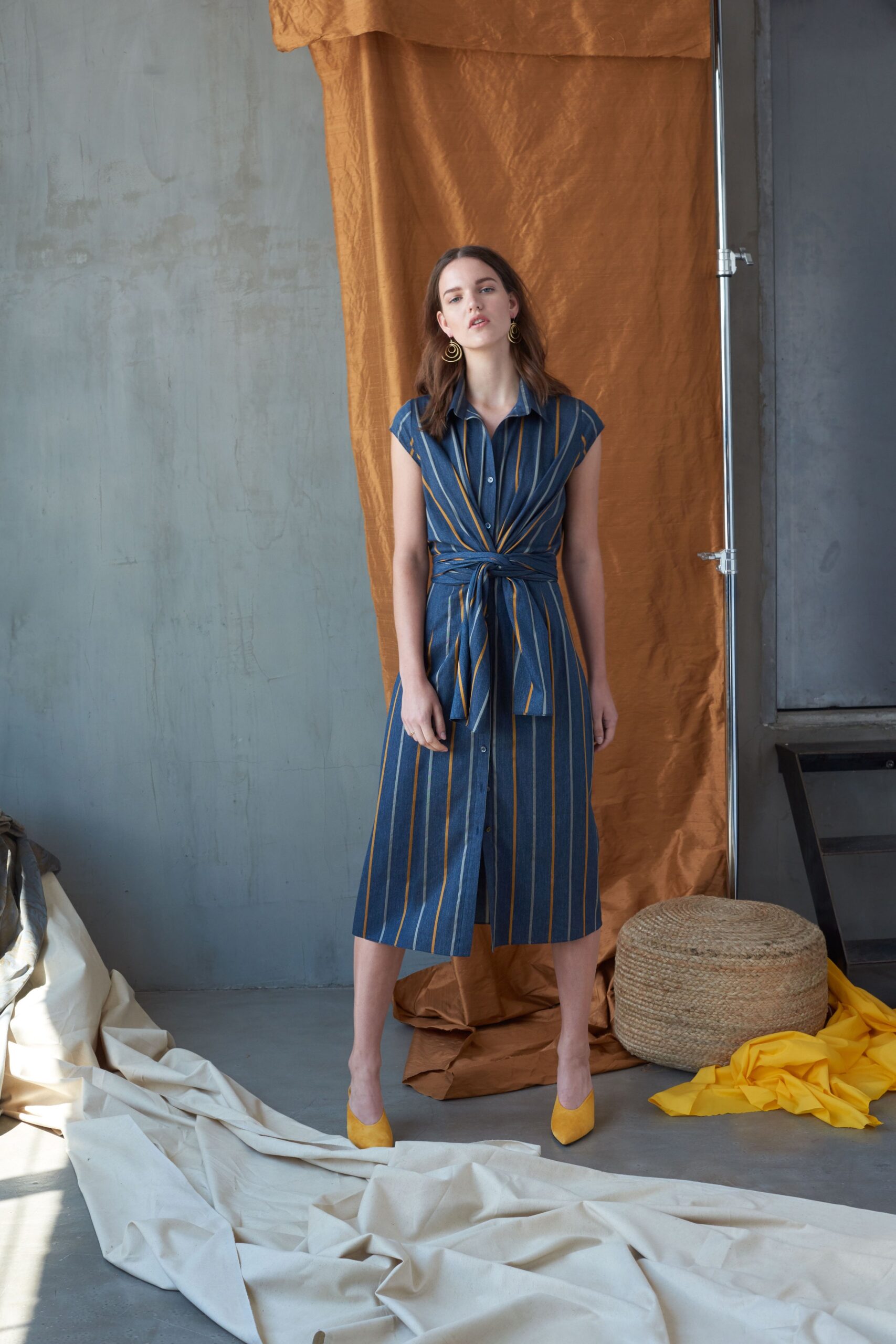 blue striped shirt-dress with yellow shoes