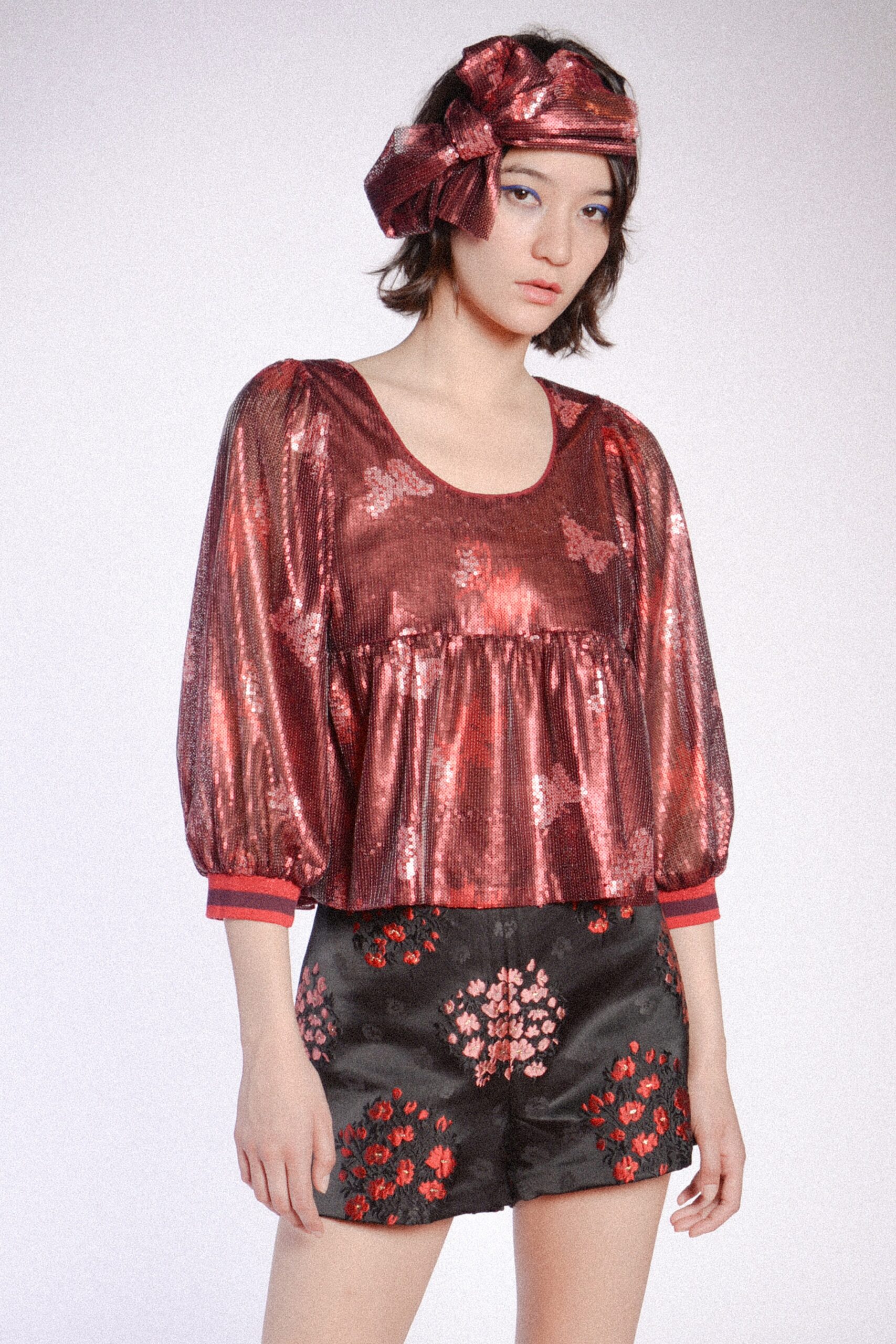 red silk sleeveless scoop-neck relaxed ruffled shiny top