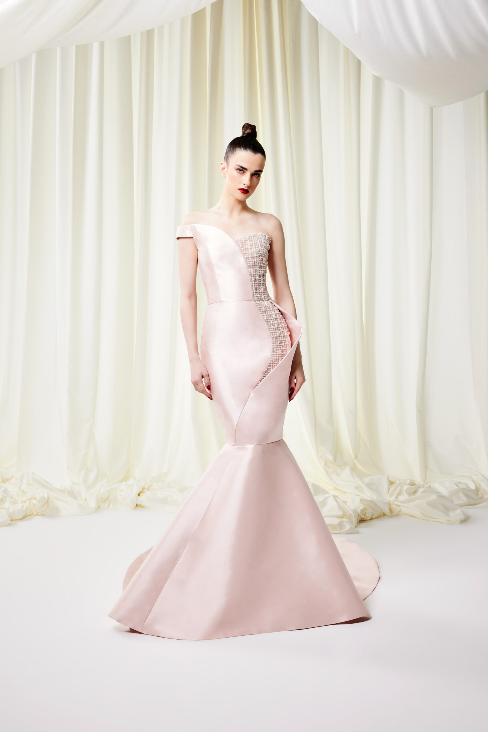fitted pink silk off-shoulder gown