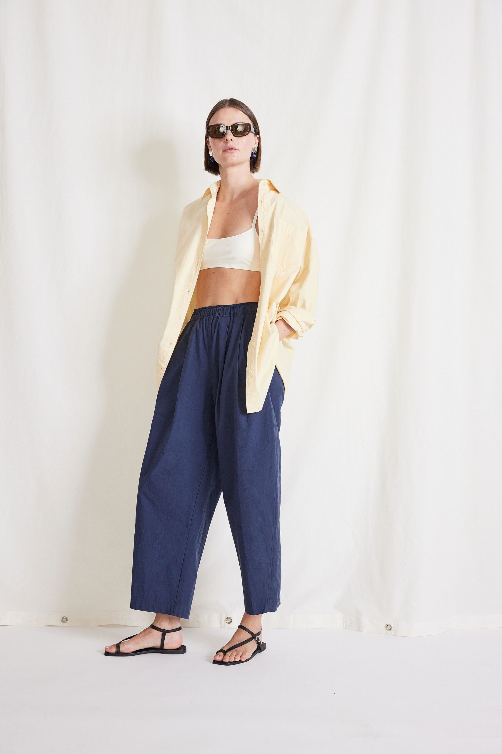 yellow shirt white top blue pants