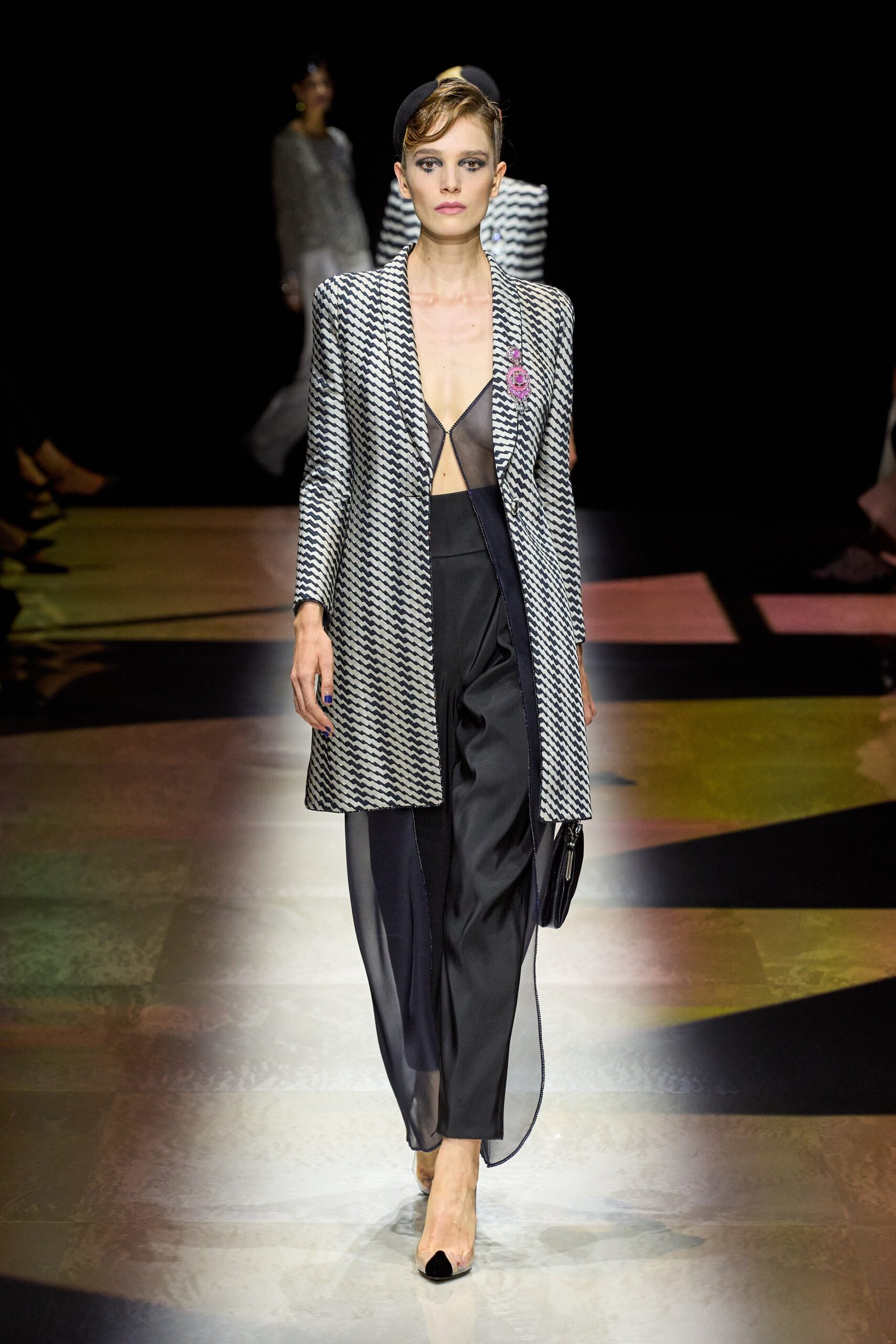 black and white printed blazer with fitted pants