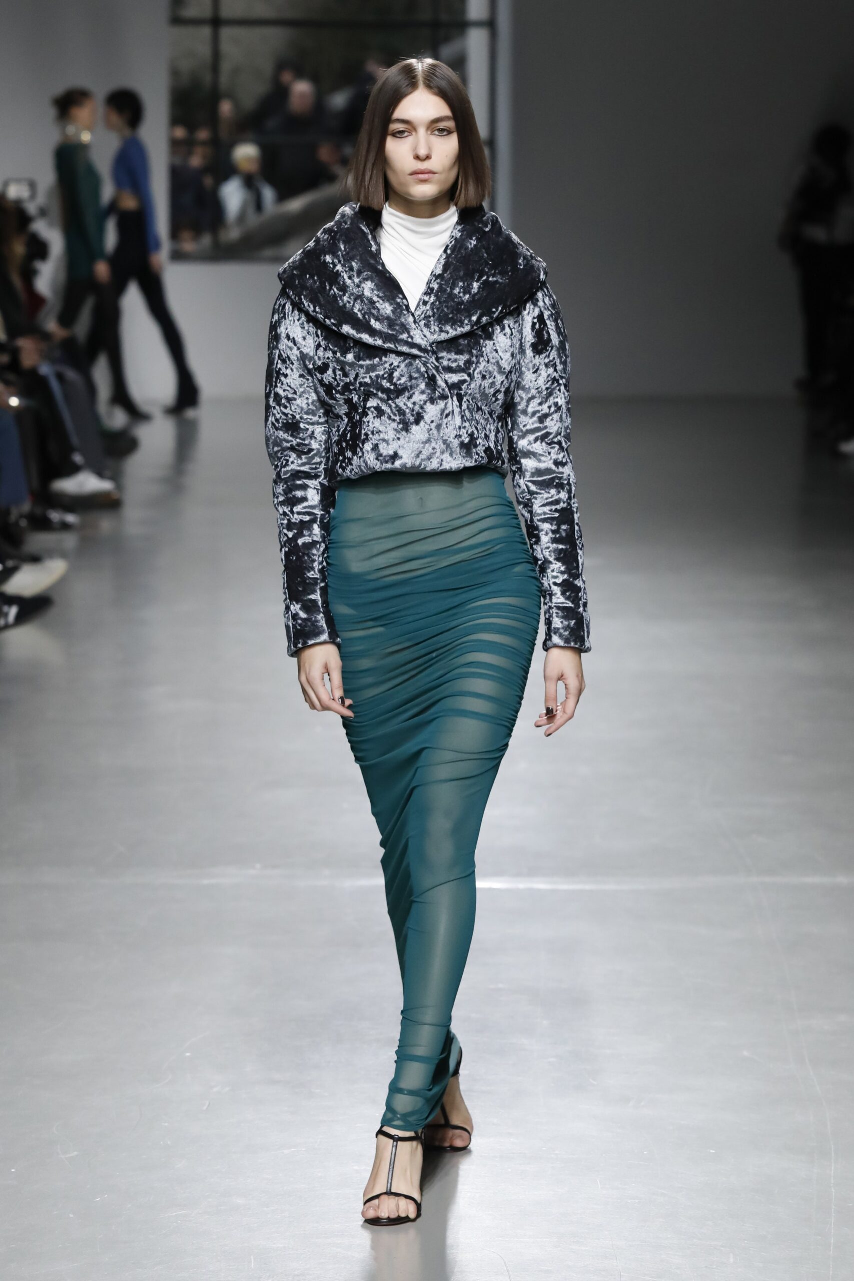 fitted velvet jacket and ruched teal skirt