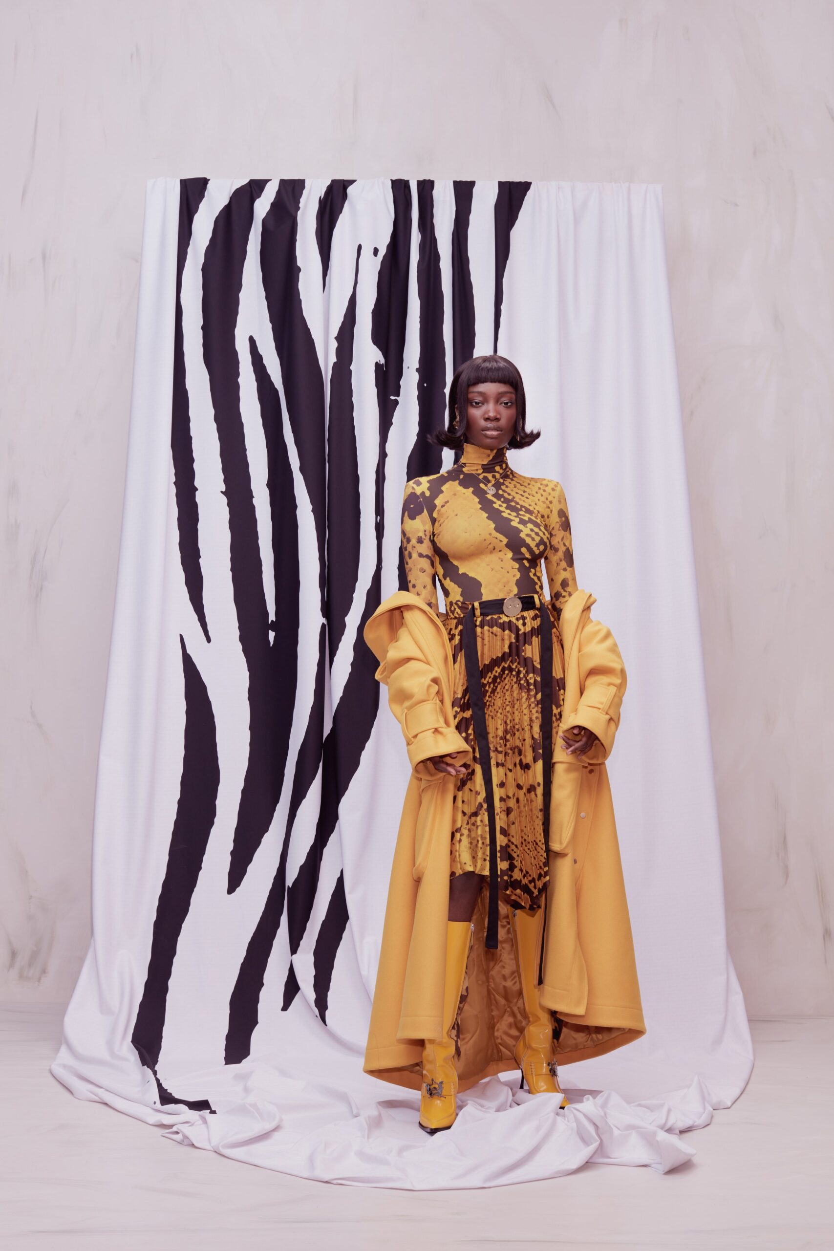 yellow printed midi dress with oversized coat