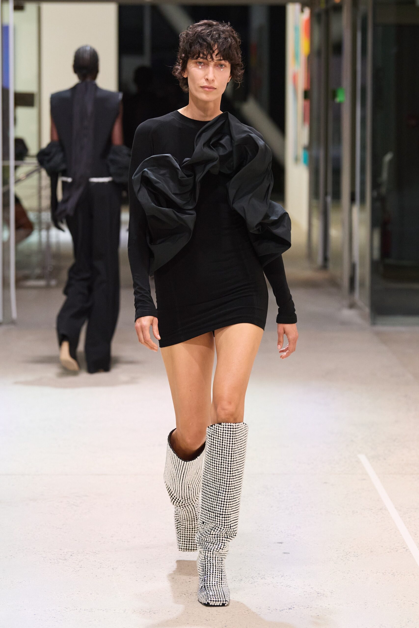 black fitted mini dress with ruffles