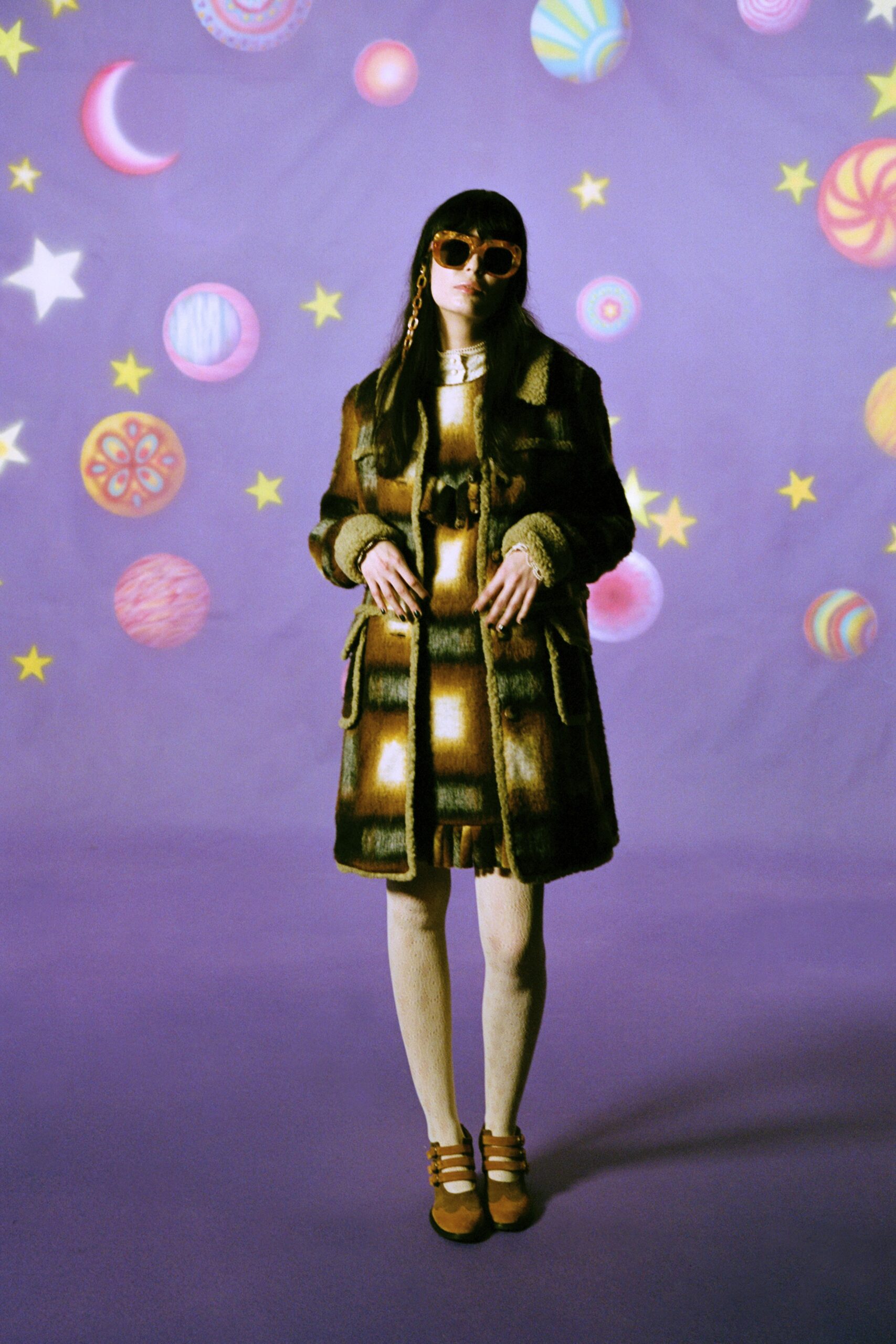 brown fur coat and mini dress