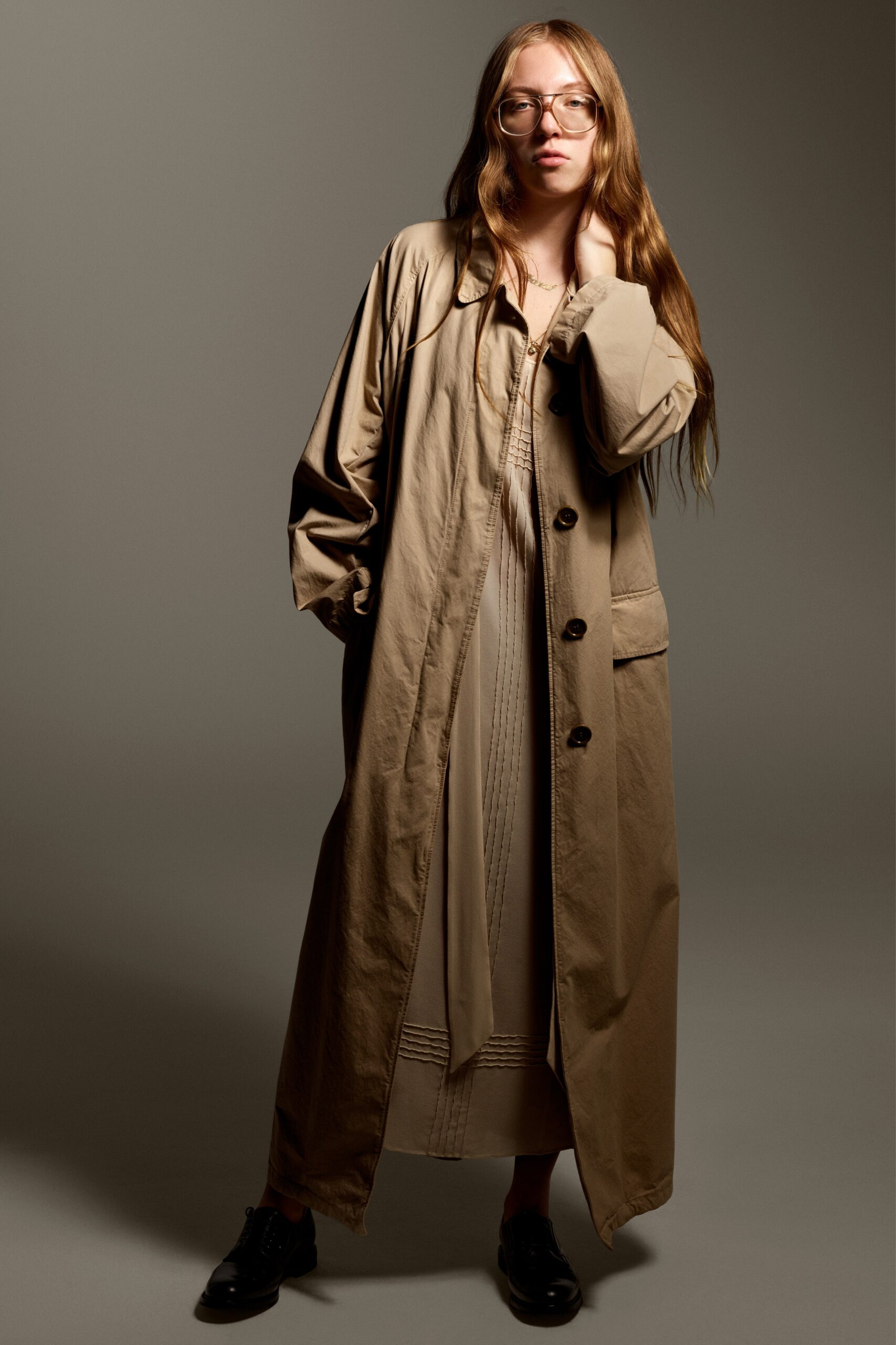 beige coat with gray dress