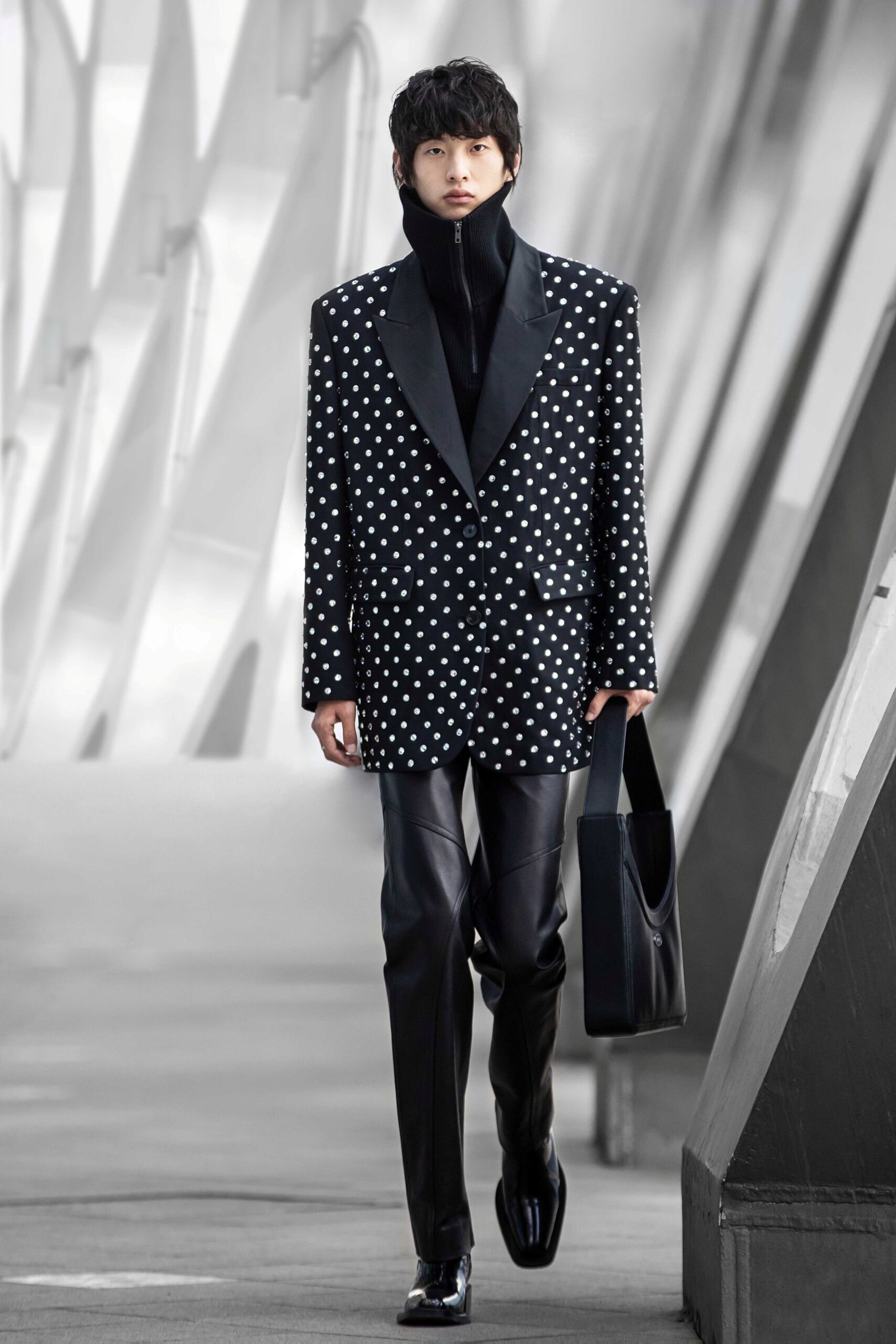 black and white polka-dot blazer with leather pants