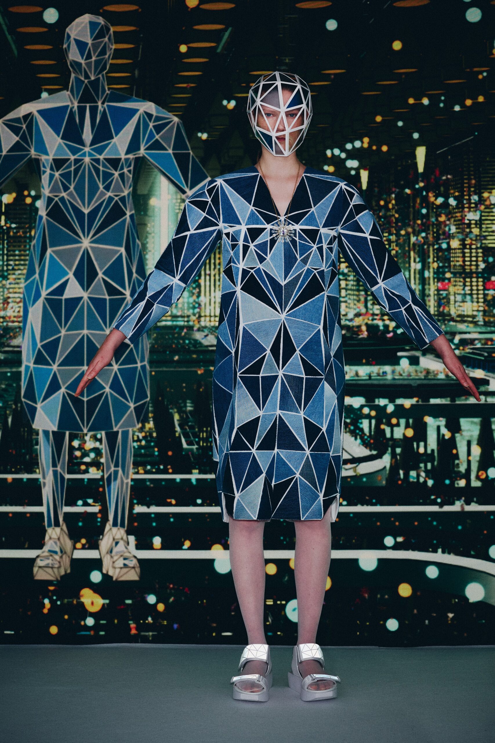 blue geometric midi dress with silver shoes
