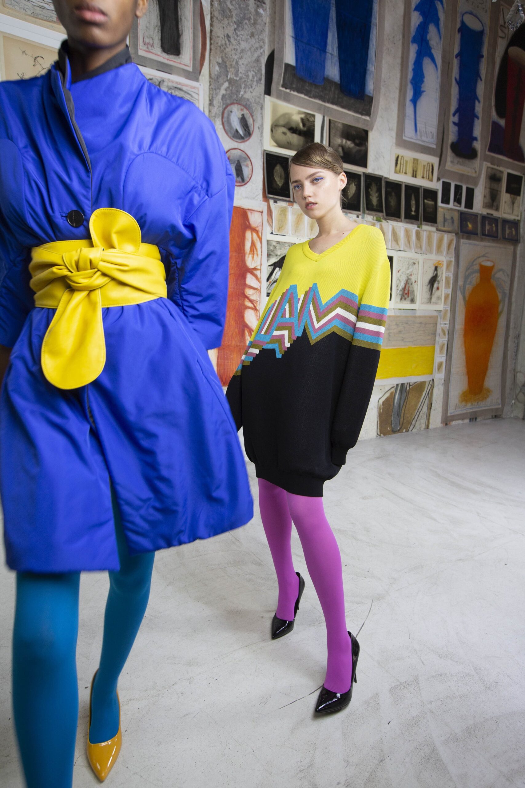 blue coat and oversized sweater