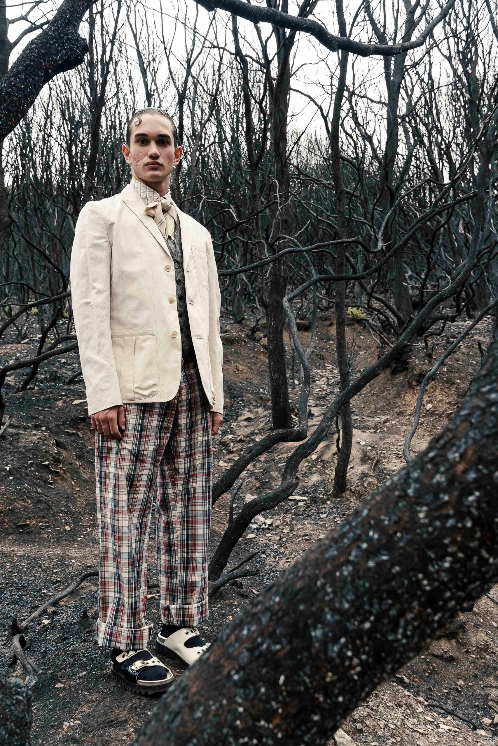 beige tailored blazer with checked pants