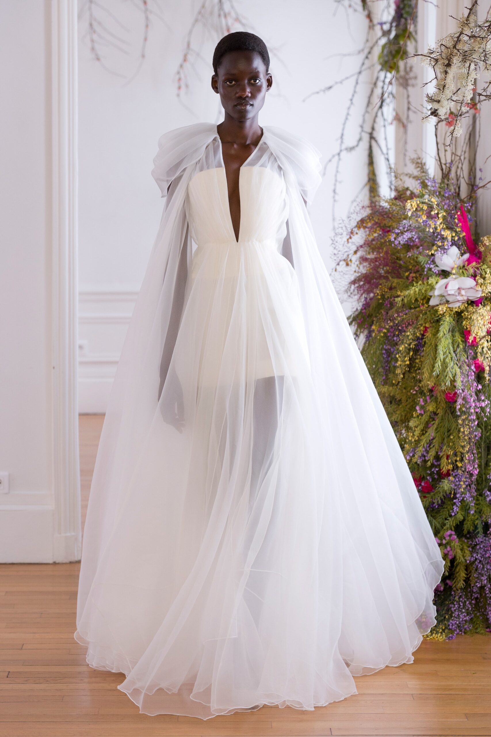 white tulle dress with cape