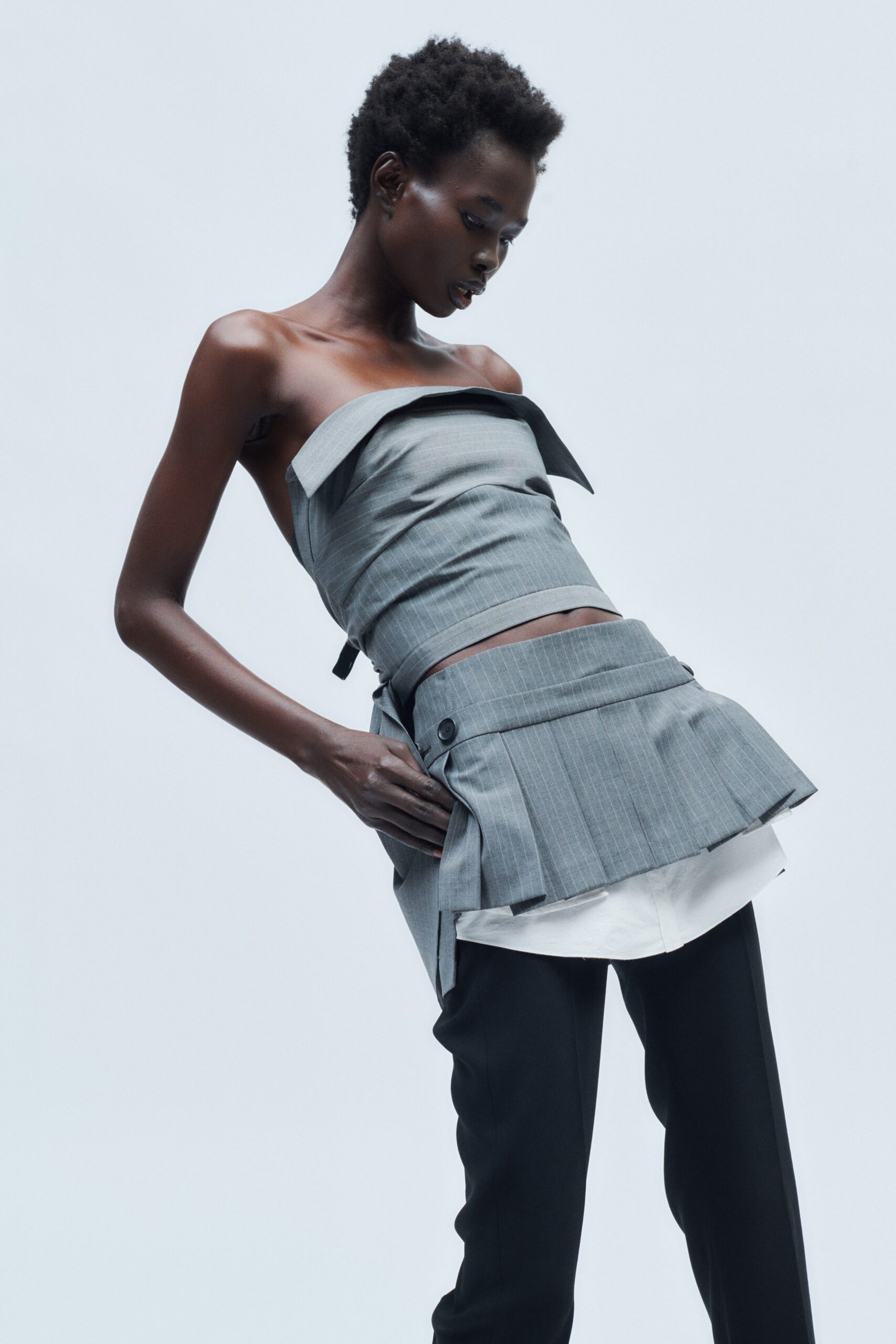 gray cotton sleeveless off-shoulder fitted pleated top