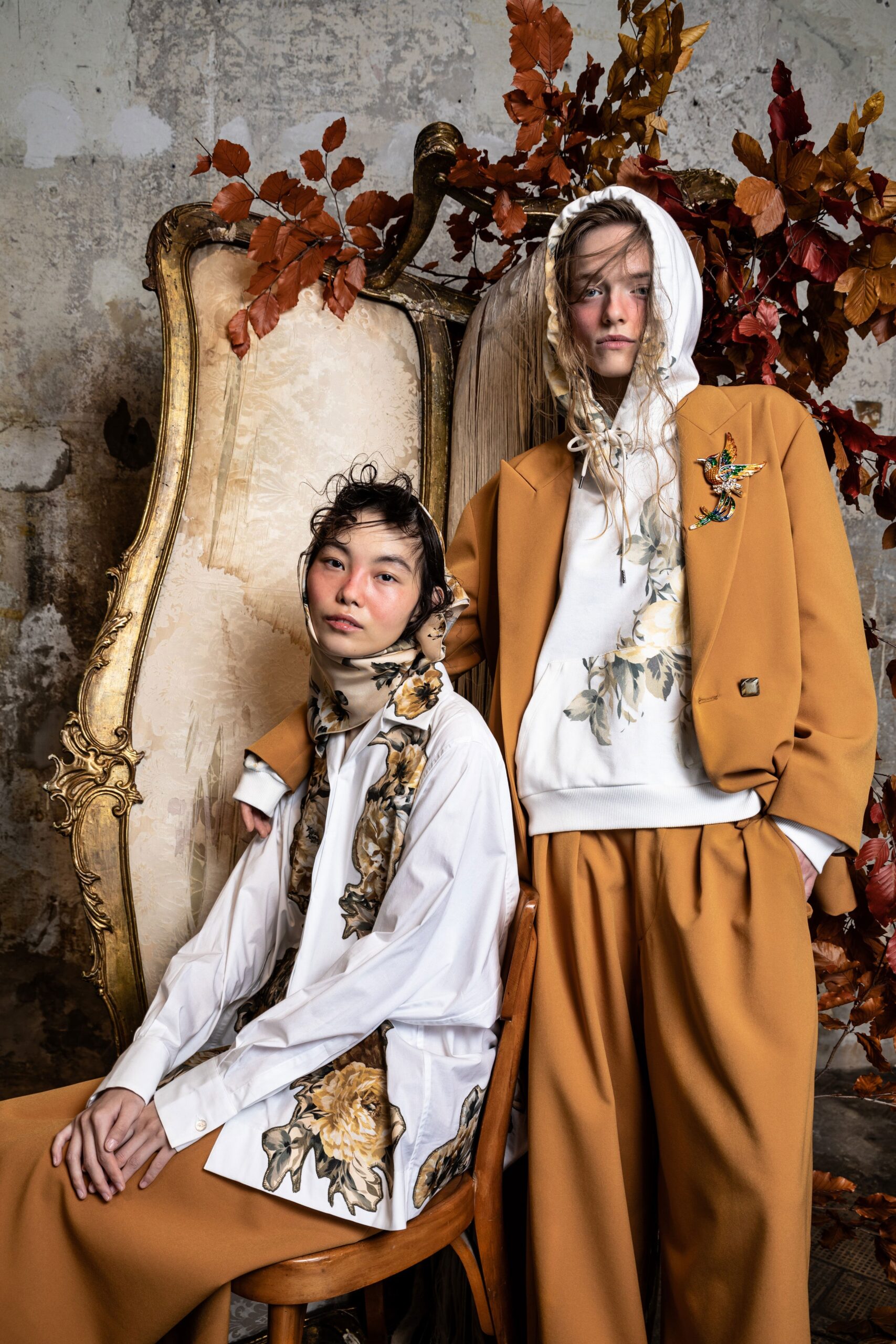 white embroidered blouse with brown pants